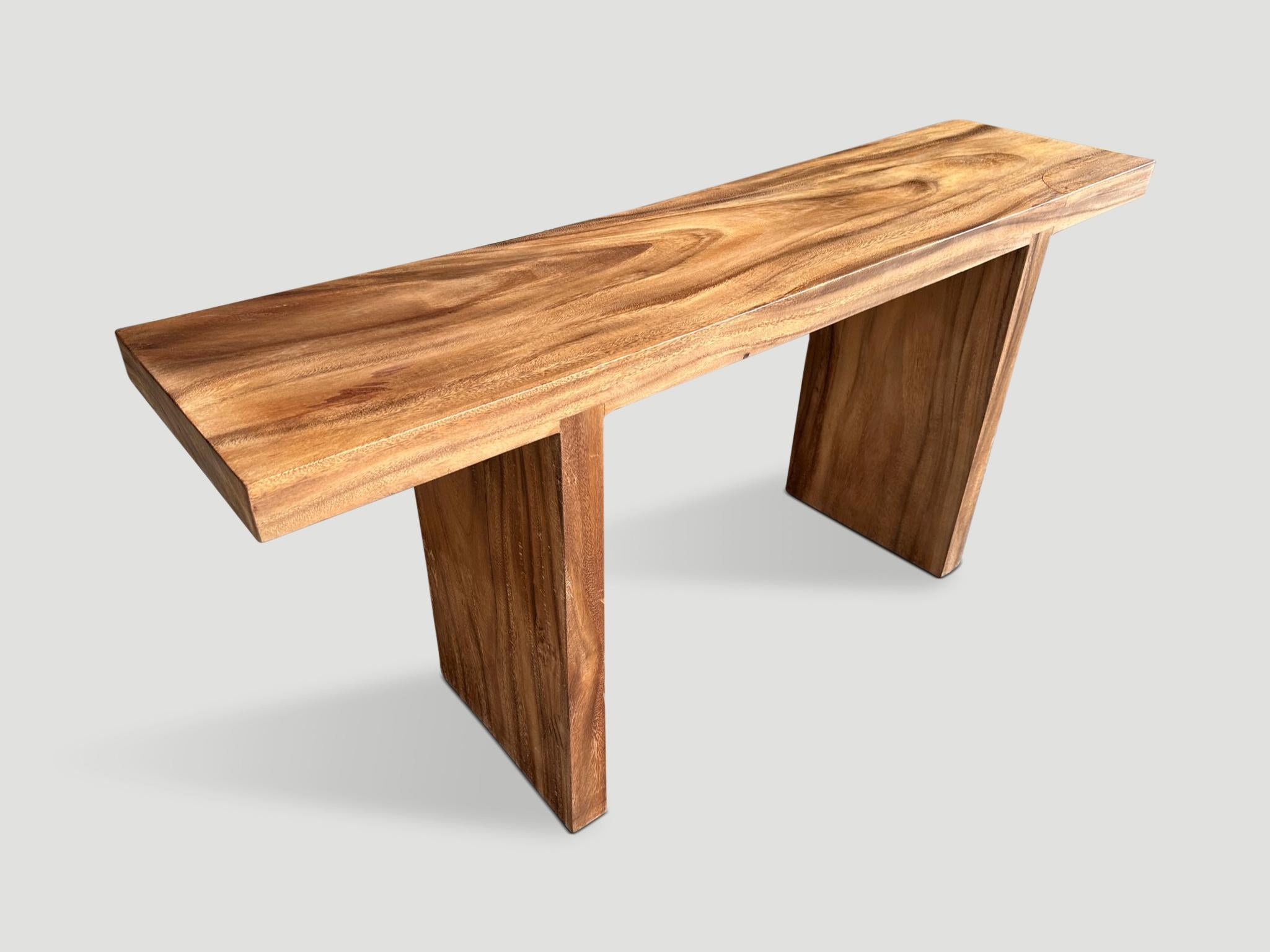 Impressive 2.5” slab suar wood minimalist console table. We added a natural oil revealing the beautiful wood grain. It’s all in the details.

Own an Andrianna Shamaris original.

Andrianna Shamaris. The Leader In Modern Organic Design. 