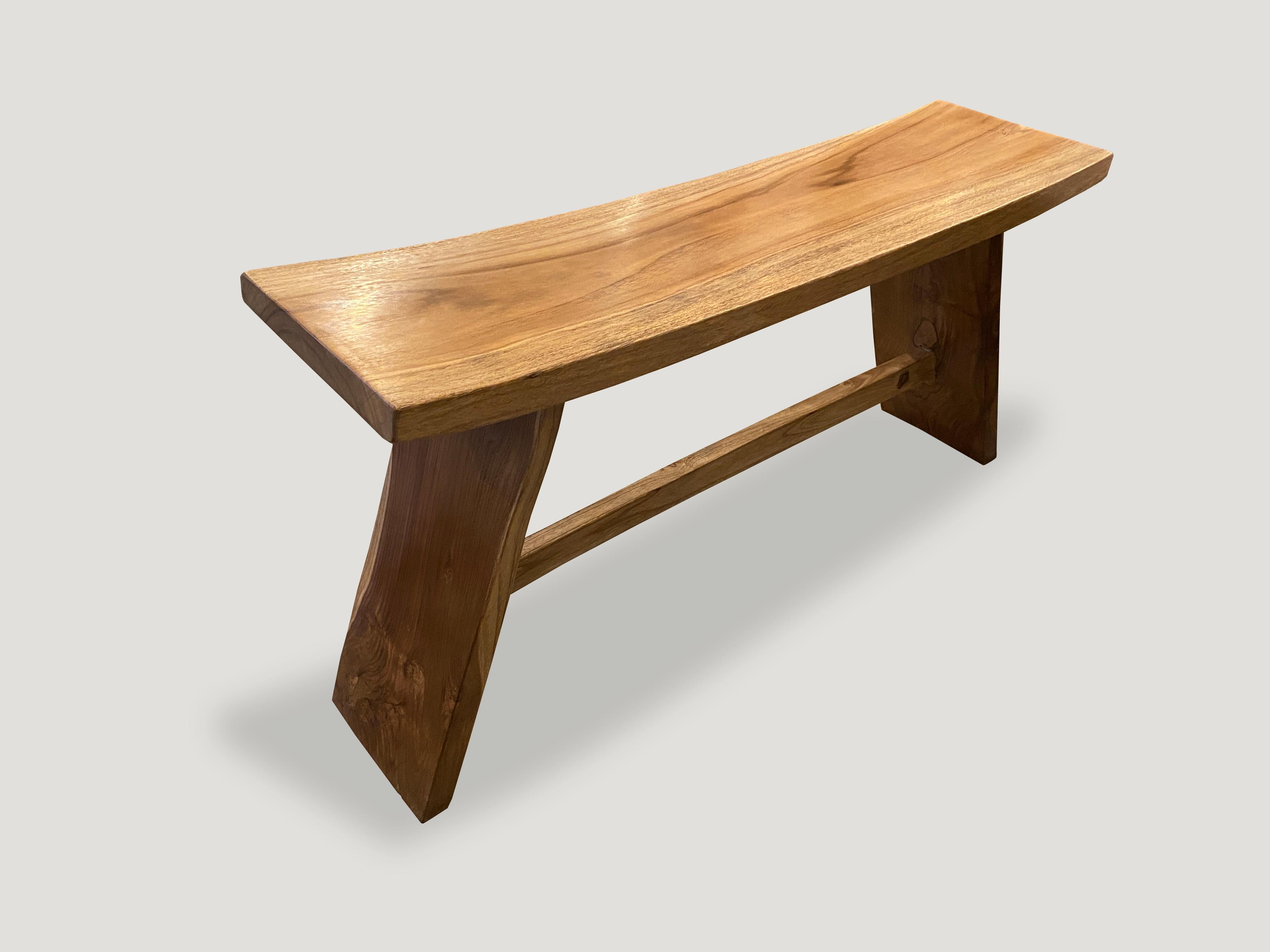 Beautiful grain on this reclaimed teak wood bench with a smooth, oil finish. The top is made from a solid teak wood slab. Perfect for inside or outside living.

Andrianna Shamaris. The Leader In Modern Organic Design.