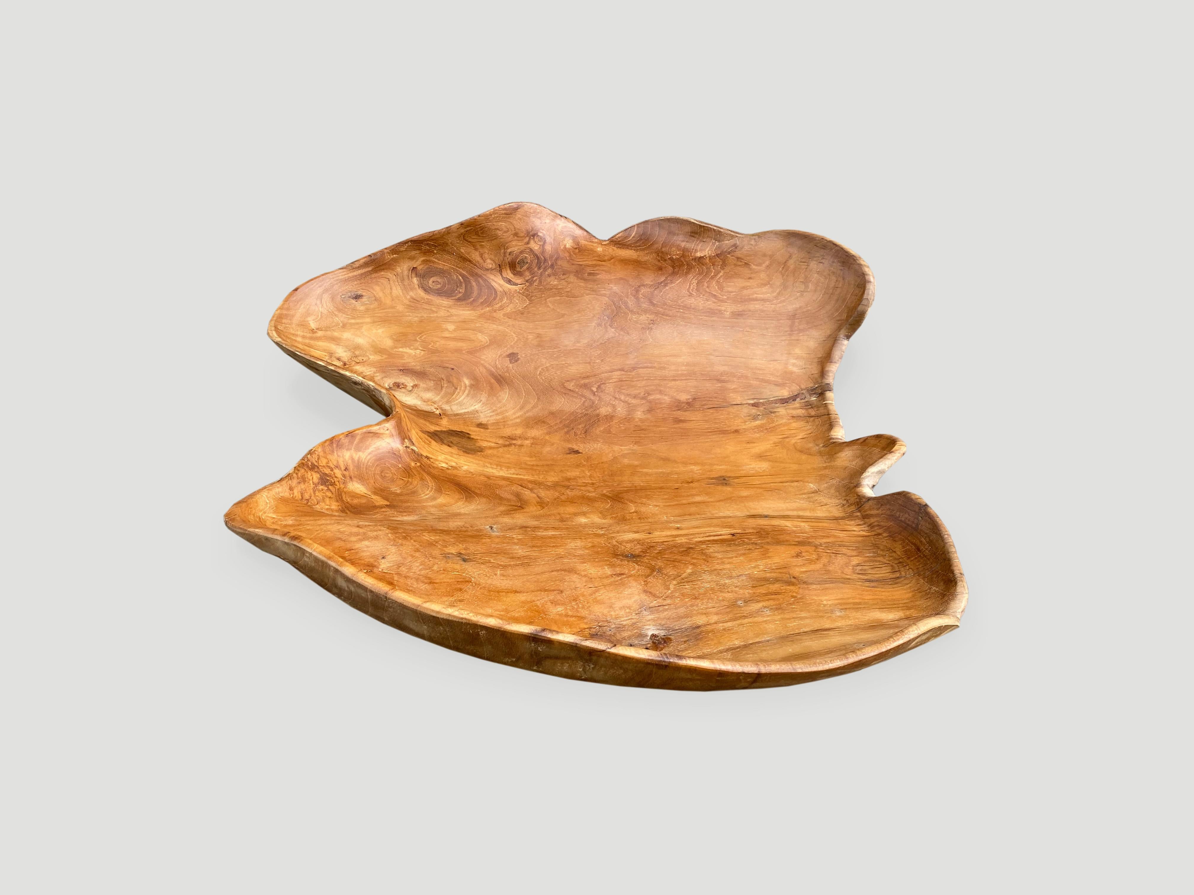 Beautiful grain on this Minimalist teak bowl, hand carved from a single piece of reclaimed teak wood.

This bowl or tray was sourced in the spirit of wabi-sabi, a Japanese philosophy that beauty can be found in imperfection and impermanence. It is