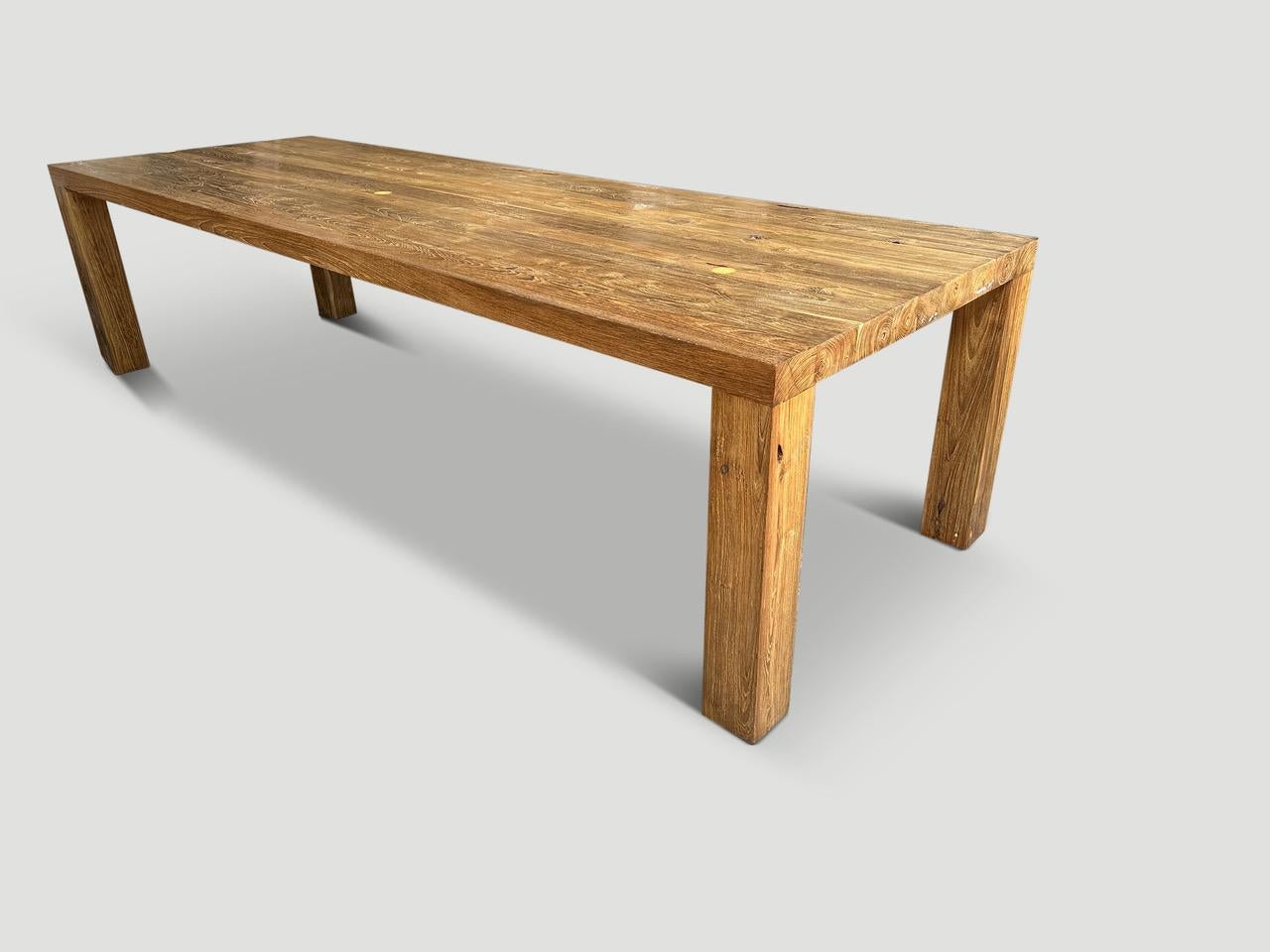 Impressive solid reclaimed teak wood dining table with 5” x 5” modern square legs and a 2.5” top. Finished with a natural oil revealing the beautiful wood grain.

Own an Andrianna Shamaris original.

Andrianna Shamaris. The Leader In Modern Organic
