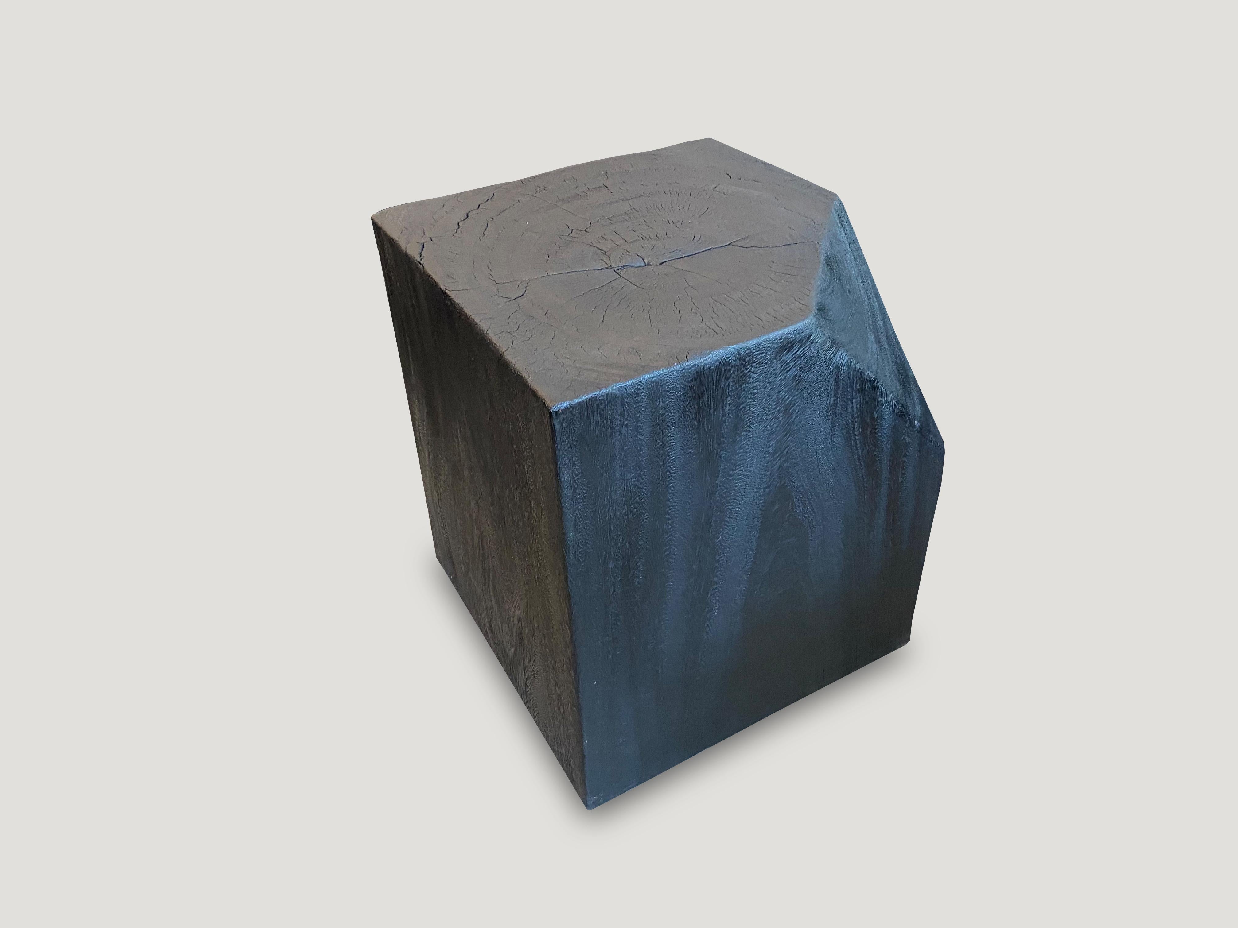 Faceted reclaimed suar wood side table, Charred, sanded and sealed, exposing the beautiful grain of the wood. We have a collection of three available. The price reflects the one shown. The final images show the three together. 

The Triple Burnt