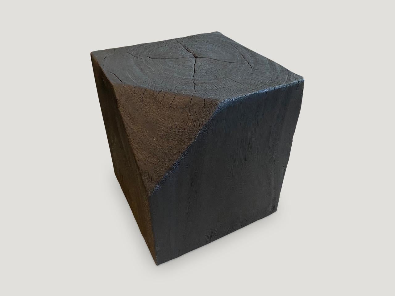 Faceted reclaimed mango wood side table, Charred, sanded and sealed revealing the beautiful wood grain. We have a collection. The price reflects one.

The Triple Burnt Collection represents a unique line of modern furniture made from solid organic