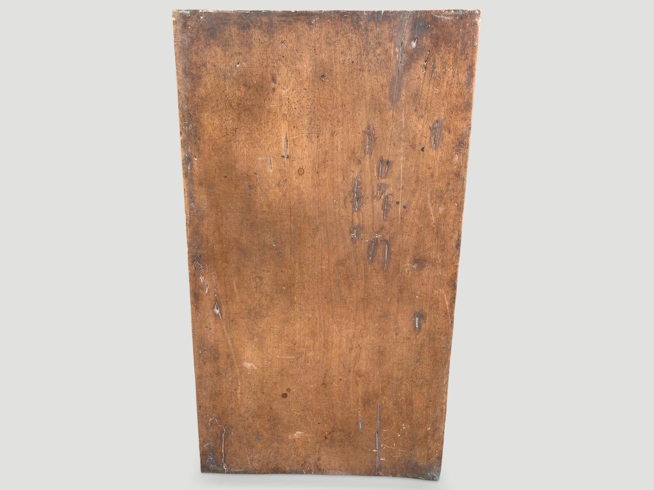 We sourced a collection of beautiful antique panels from the island of Nias. Covered in dense tropical jungle, the islands of Nias are located off the western coast of Sumatra, Indonesia. Strong currents and rough seas have isolated the islands and