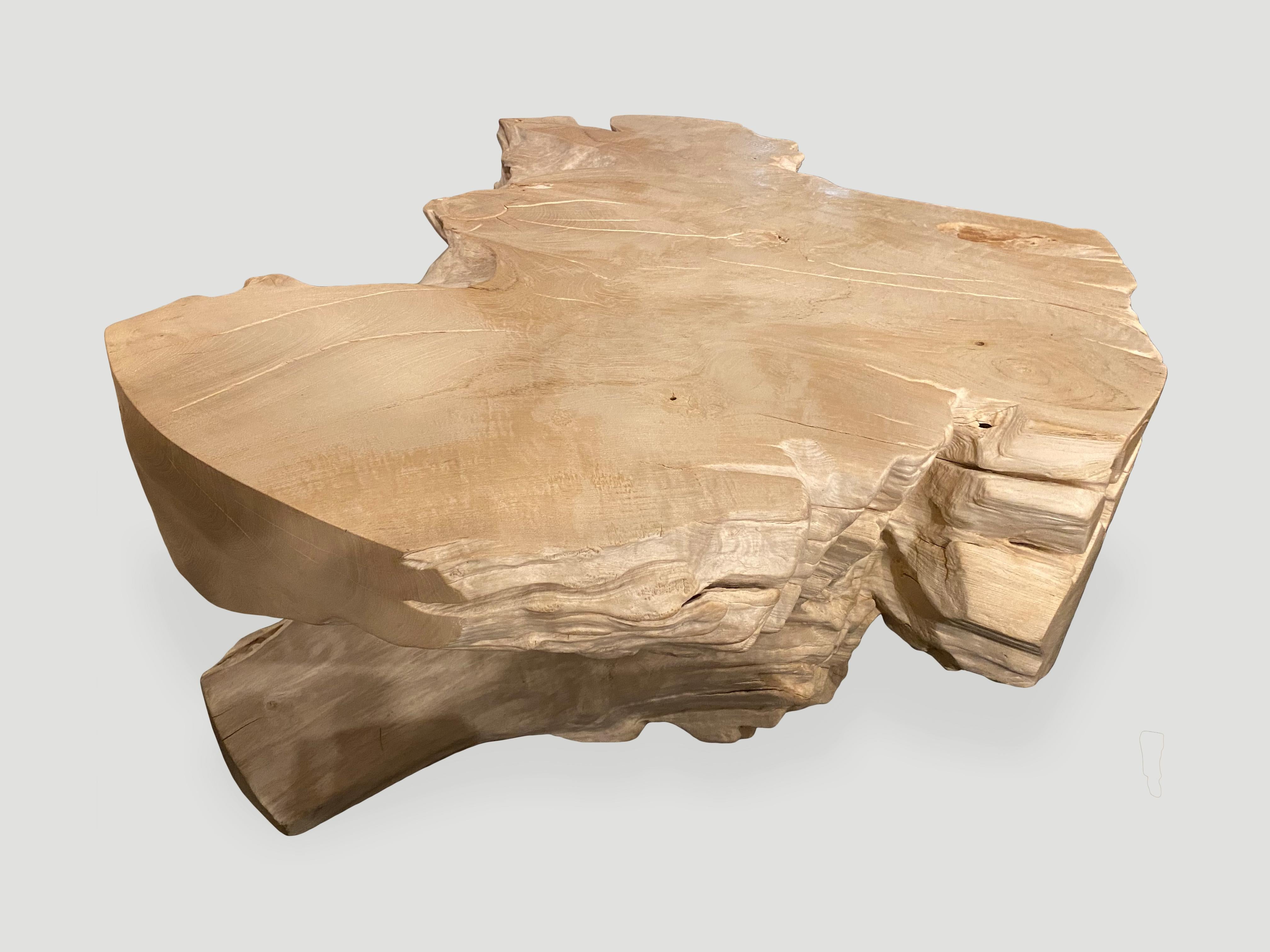 Beautiful organic teak root coffee table with stunning erosion detail. The reclaimed teak is bleached and left to bake in the sun and sea salt air for over a year to achieve this unique finish. We have added a light shellack to the top and flat side