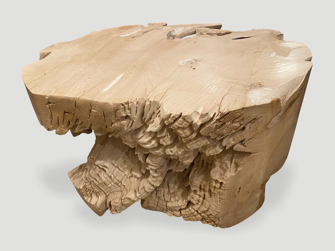 Beautiful single root organic coffee table or oversized side table with stunning erosion detail on one side. The reclaimed teak is bleached and left to bake in the sun and sea salt air for over a year to achieve this unique finish. We have added a