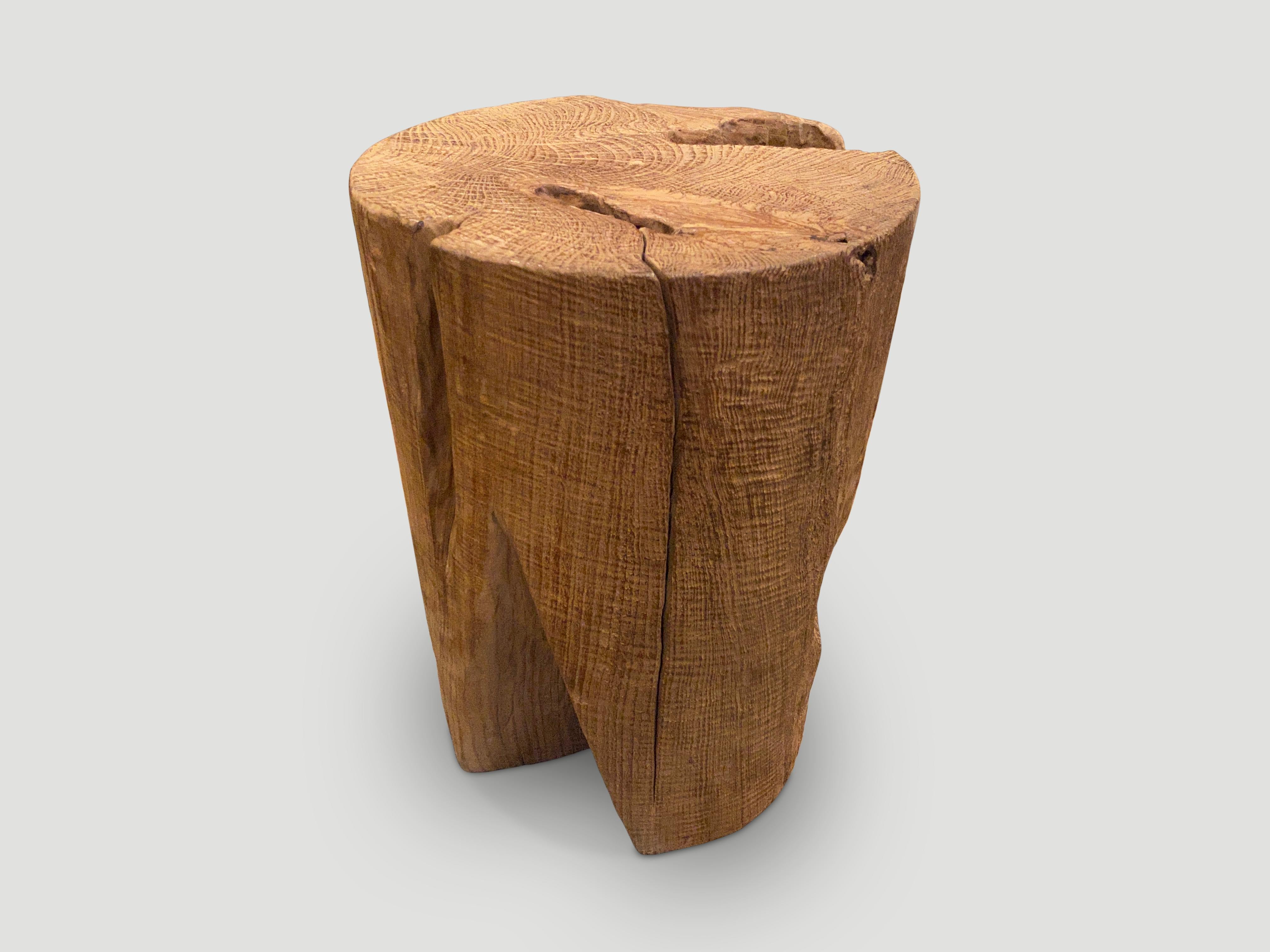 Reclaimed teak wood side table which we have hand carved into this beautiful cylinder shape whilst respecting the organic wood. We used an iron brush to reveal the natural wood grain.

This side table was hand made in the spirit of Wabi-Sabi, a