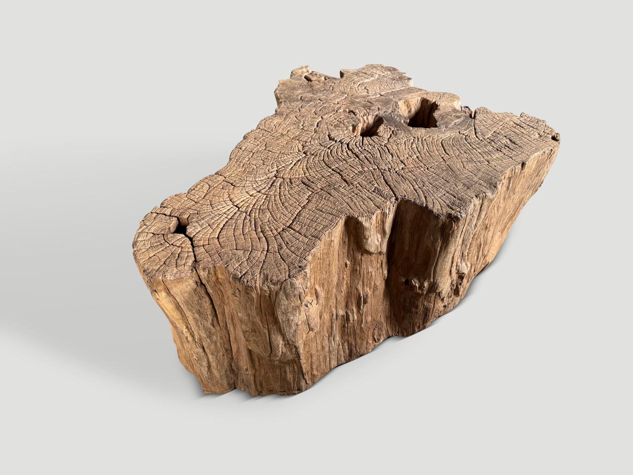 Rare century old teak wood has been hand carved whilst respecting the natural organic shape and finally turned into an impressive one of a kind coffee table. Finished with a natural oil revealing the beautiful unique wood grain. It’s all in the