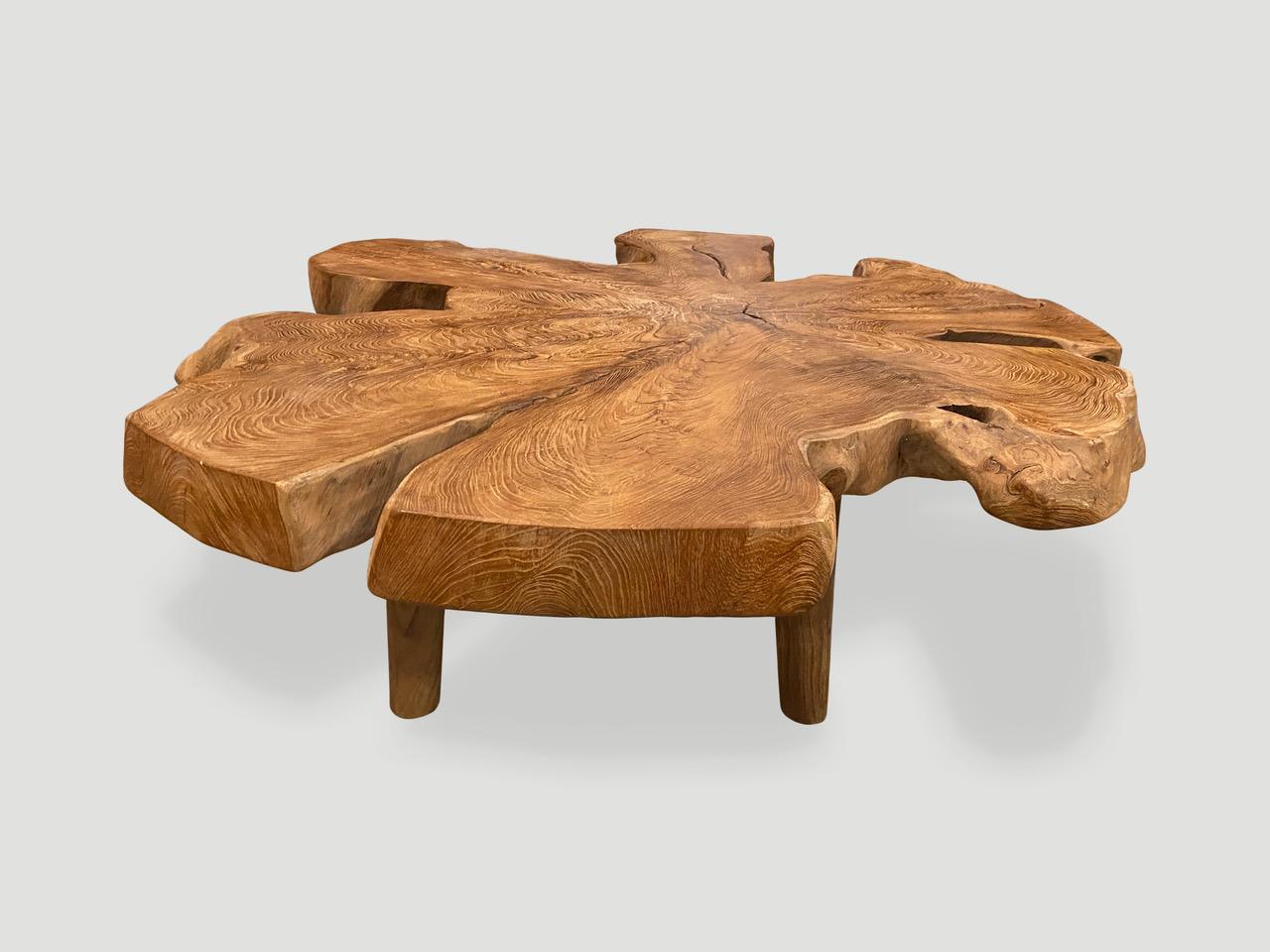 Impressive three inch reclaimed teak wood coffee table. Floating on minimalist cylinder legs with a natural oil finish revealing the beautiful wood grain. Organic with a twist. 

Own an Andrianna Shamaris original.

Andrianna Shamaris. The