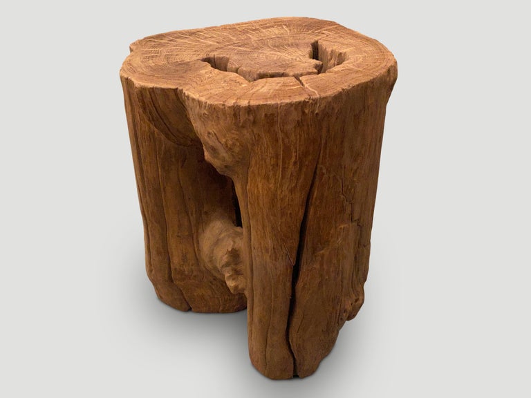Reclaimed teak wood with a beautiful organic shape. We used an iron brush to reveal the natural wood grain.

This side table or pedestal was hand made in the spirit of Wabi-Sabi, a Japanese philosophy that beauty can be found in imperfection and