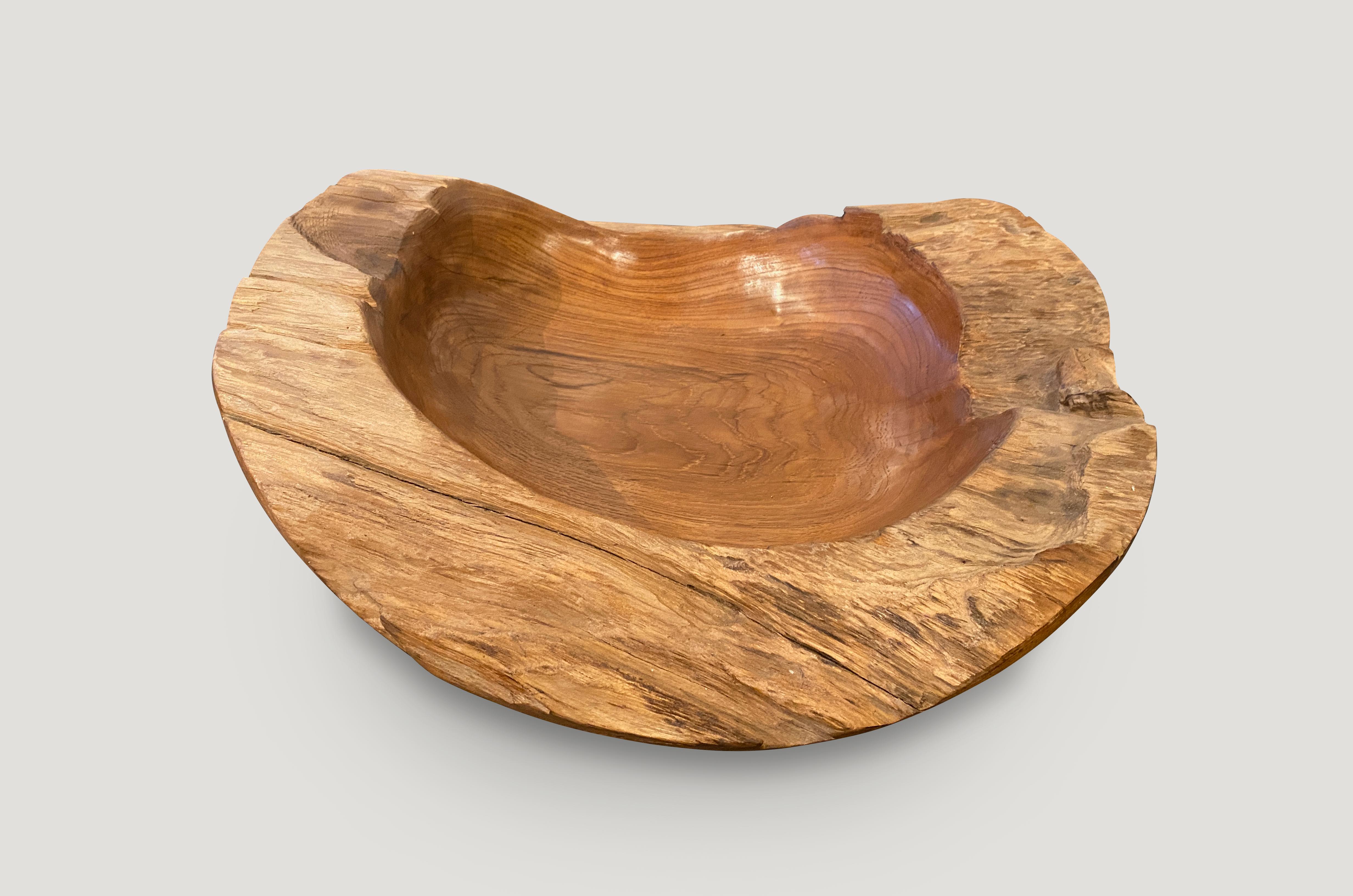This organic teak vessel serves as a stunning sculptural piece and a practical solution to hold fruit, magazines, towels, etc. We left the sides raw in contrast. Organic is the new modern.

Own an Andrianna Shamaris original.

Andrianna Shamaris.