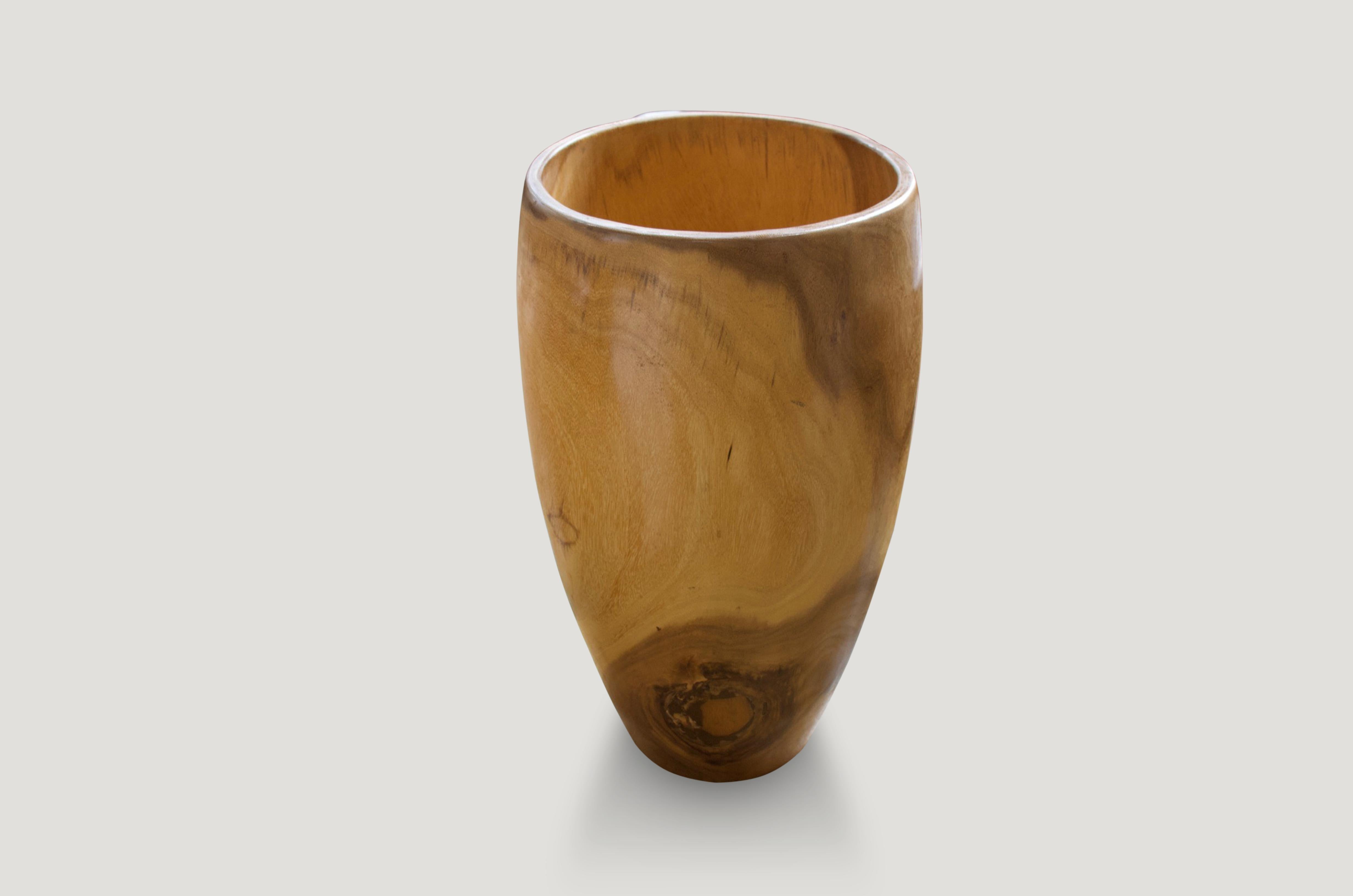 Hollowed out drum container in natural palm wood. Great as a sculptural art piece or umbrella holder. Measures: 28