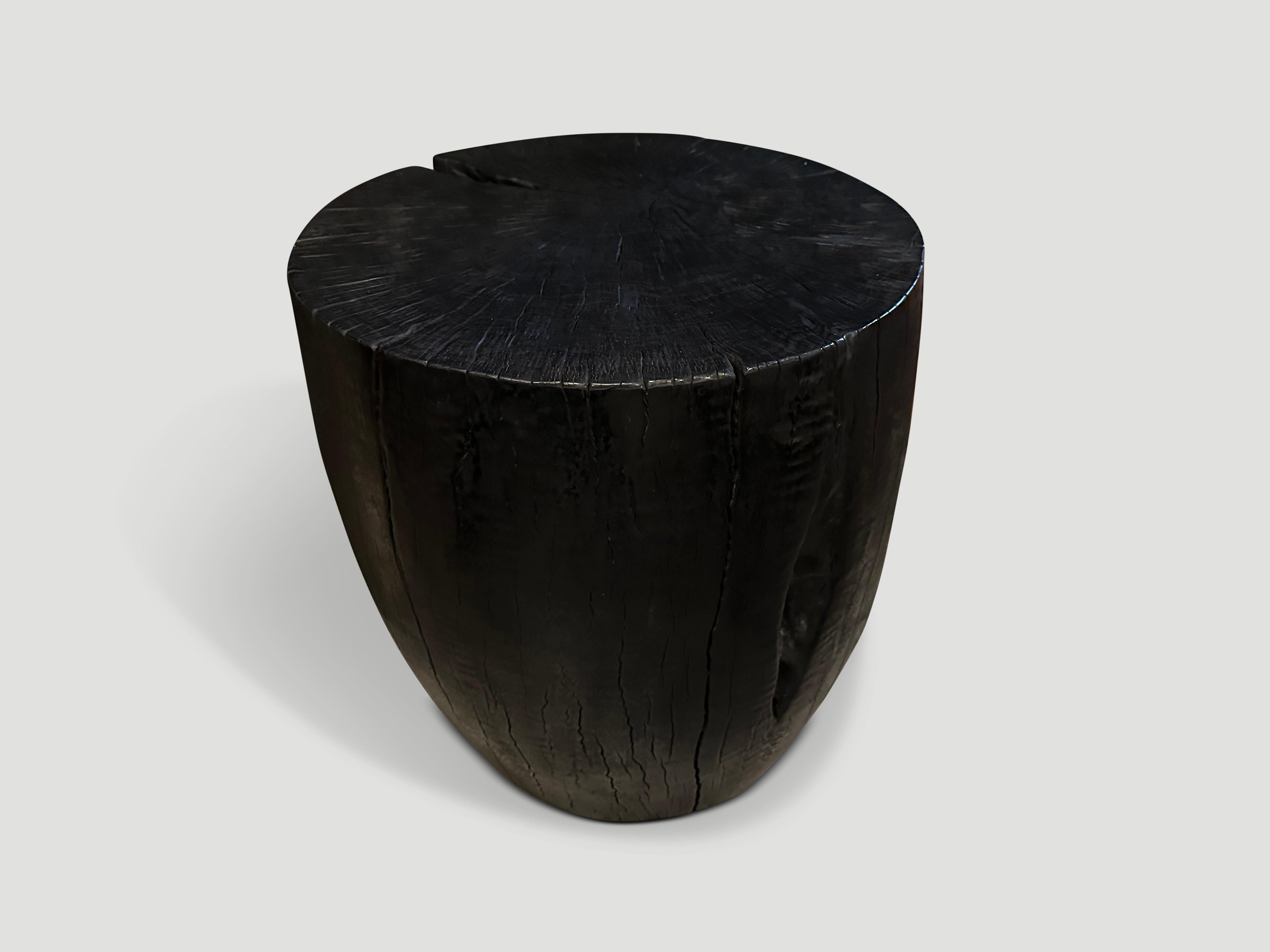 Reclaimed Mango wood hand carved into this stunning drum shape whilst respecting the natural organic wood. Burnt, sanded and sealed revealing the beautiful wood grain.

The Triple Burnt Collection represents a unique line of modern furniture made