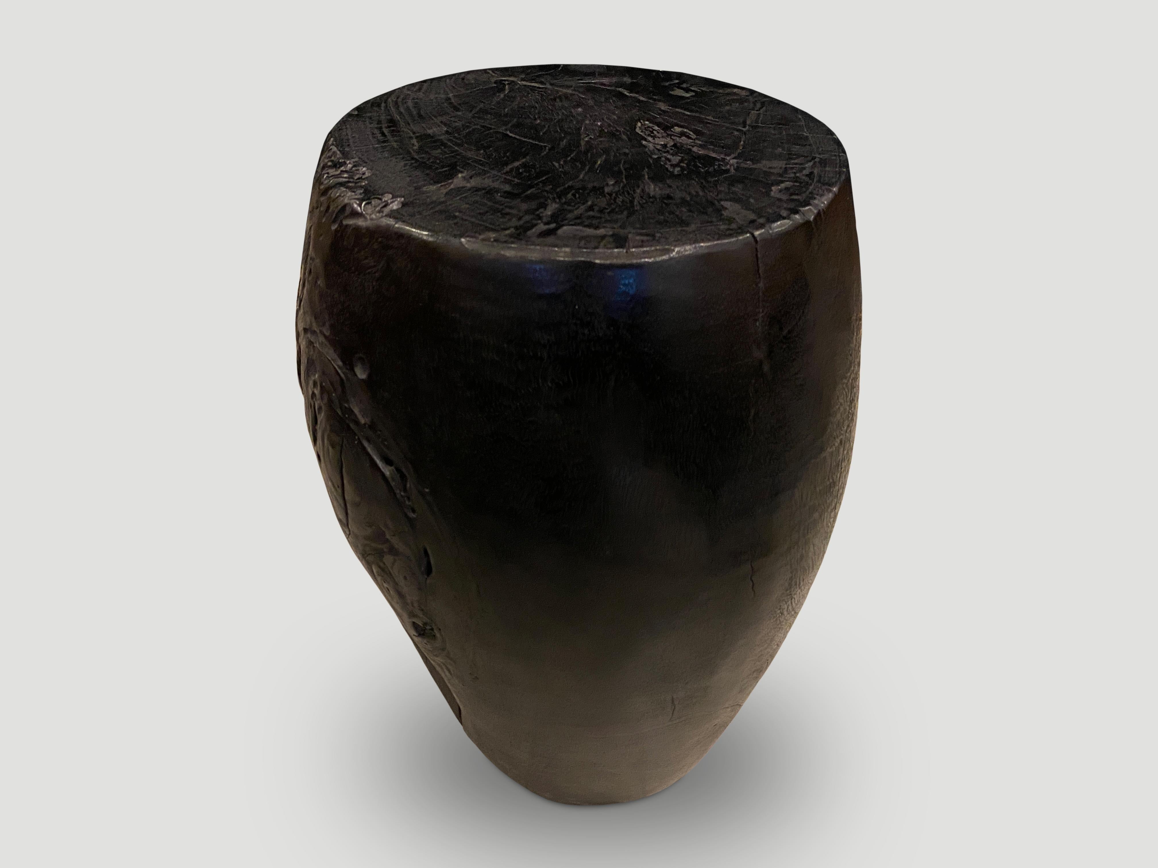 Reclaimed Mango wood charred and hand carved into this stunning drum shape whilst respecting the natural organic wood. Burnt, sanded and sealed revealing the beautiful wood grain.

The Triple Burnt Collection represents a unique line of modern