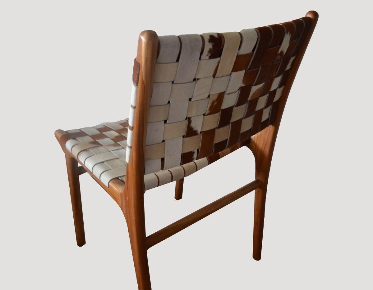 Premium quality double-back woven cowhide with teak frame.

Introducing the Premium Quality Cowhide Chair in the new double-back woven style. We utilize the finest quality cowhide for our modern chairs. The hand-selected cowhide is carefully woven