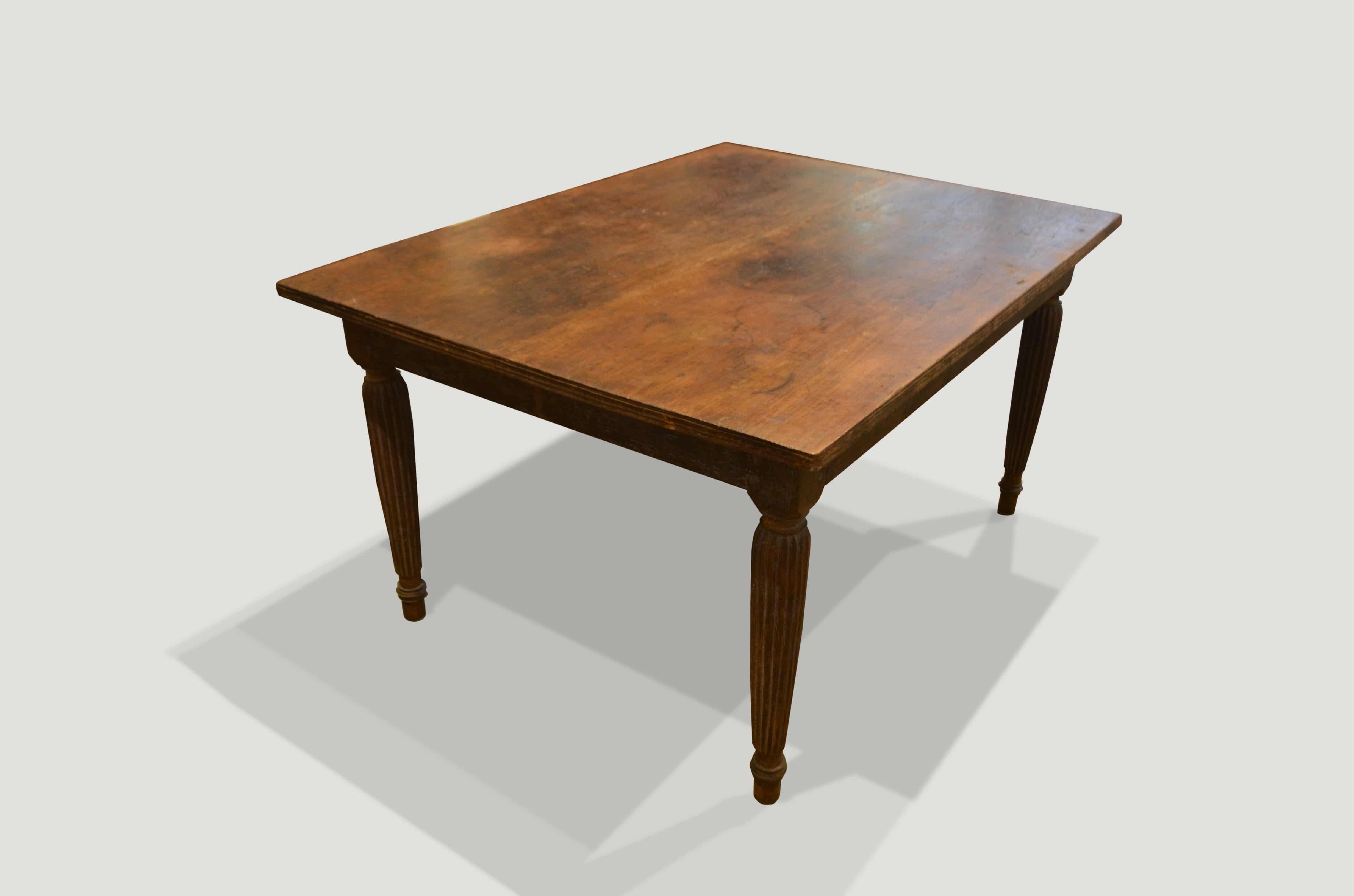 Andrianna Shamaris Raffles Influenced Teak Wood Dining Table In Excellent Condition For Sale In New York, NY