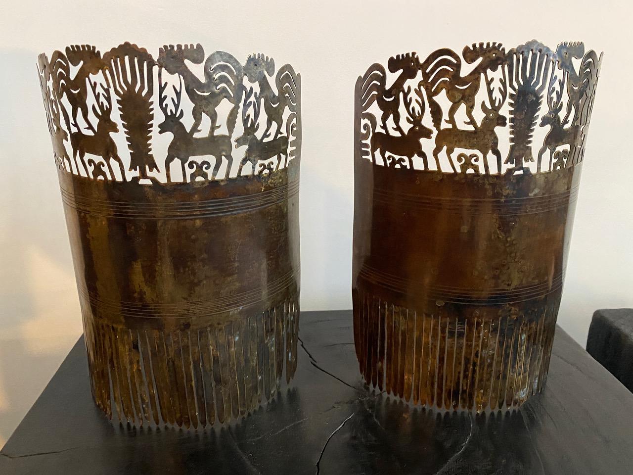 Worn by adult noblewomen high on the head, like a crown. These hand cut combs from Sumba are usually hand carved from mottled tortoiseshell or occasionally from buffalo horn. These two are hand made from polished metal with stunning patina. Rare. C
