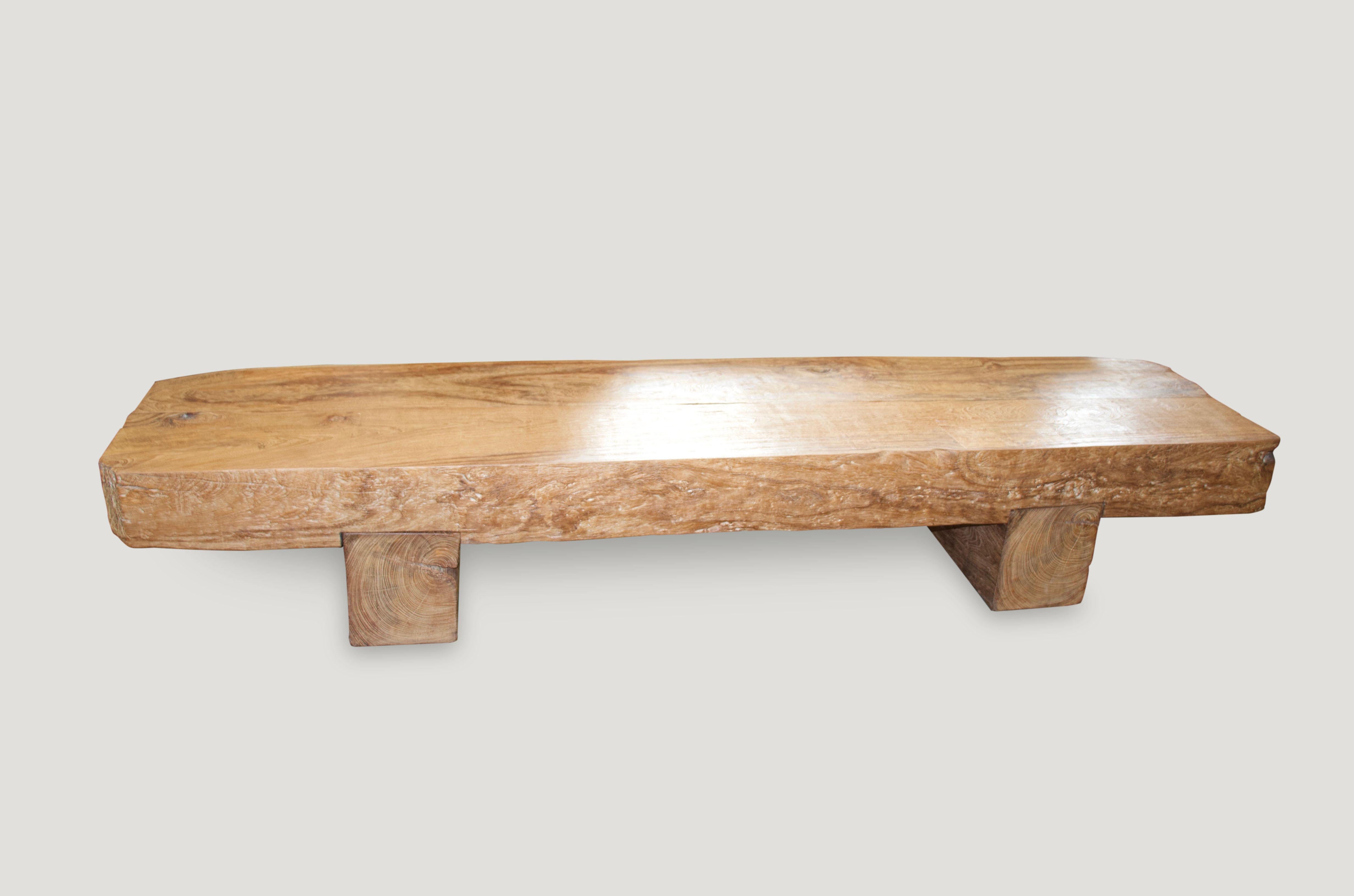 Beautiful natural reclaimed teak wood coffee table or bench with stunning patina. Two 7.5” thick teak wood slabs make this an impressive piece. Set on modern legs.

We can custom the legs for a dining table or console if preferred. Please