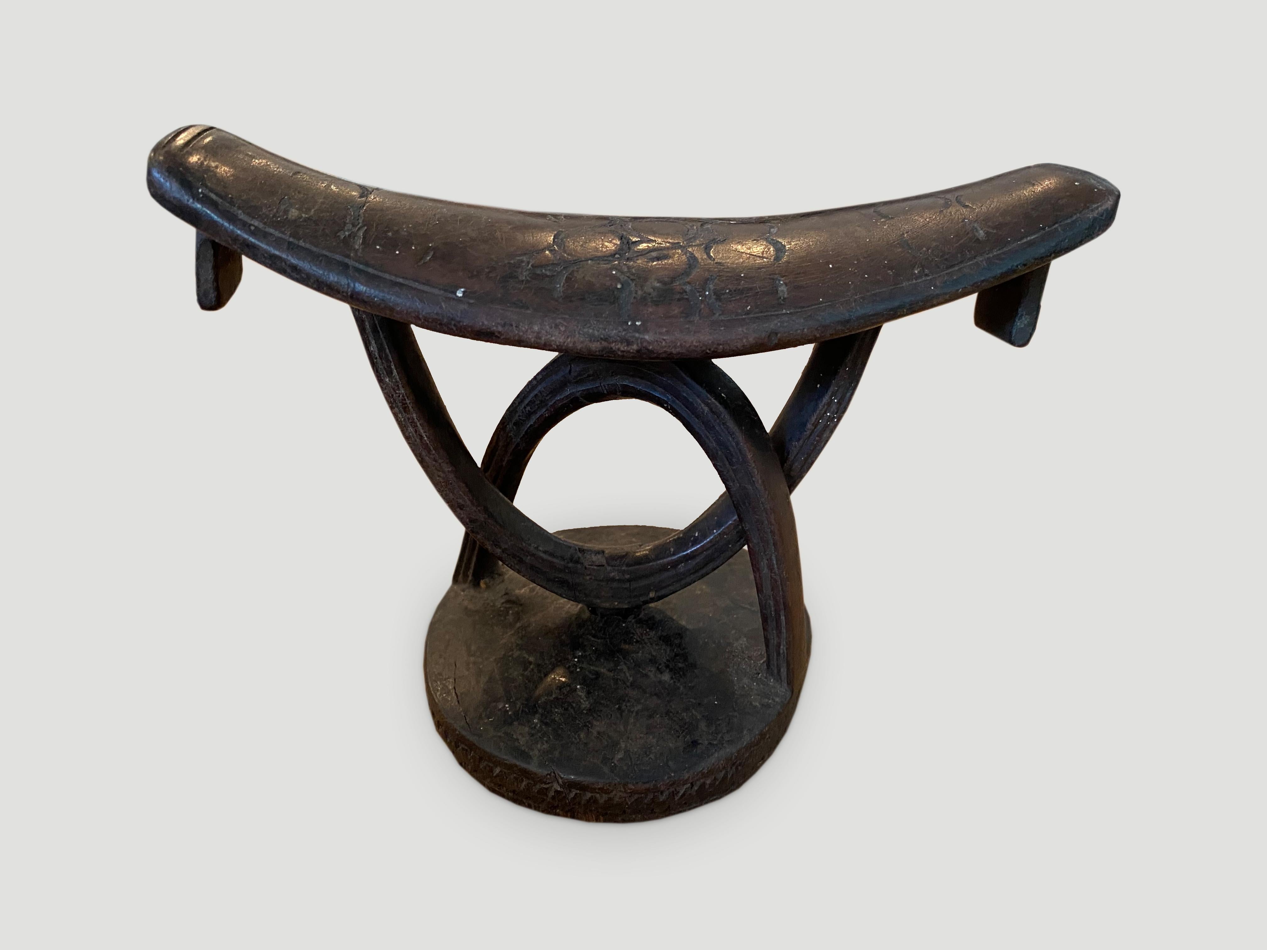 Early 20th Century Andrianna Shamaris Rotating Antique African Wooden Head Rest