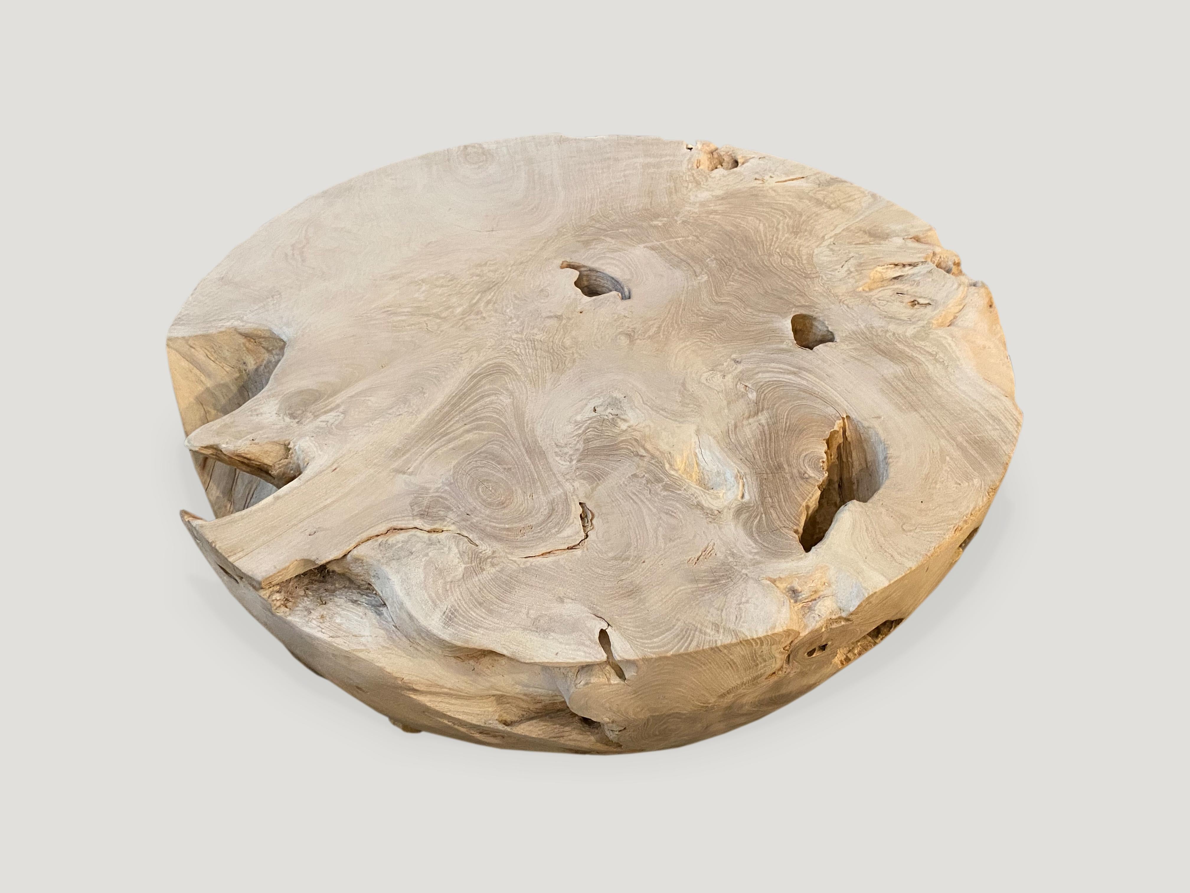round bleached wood coffee table