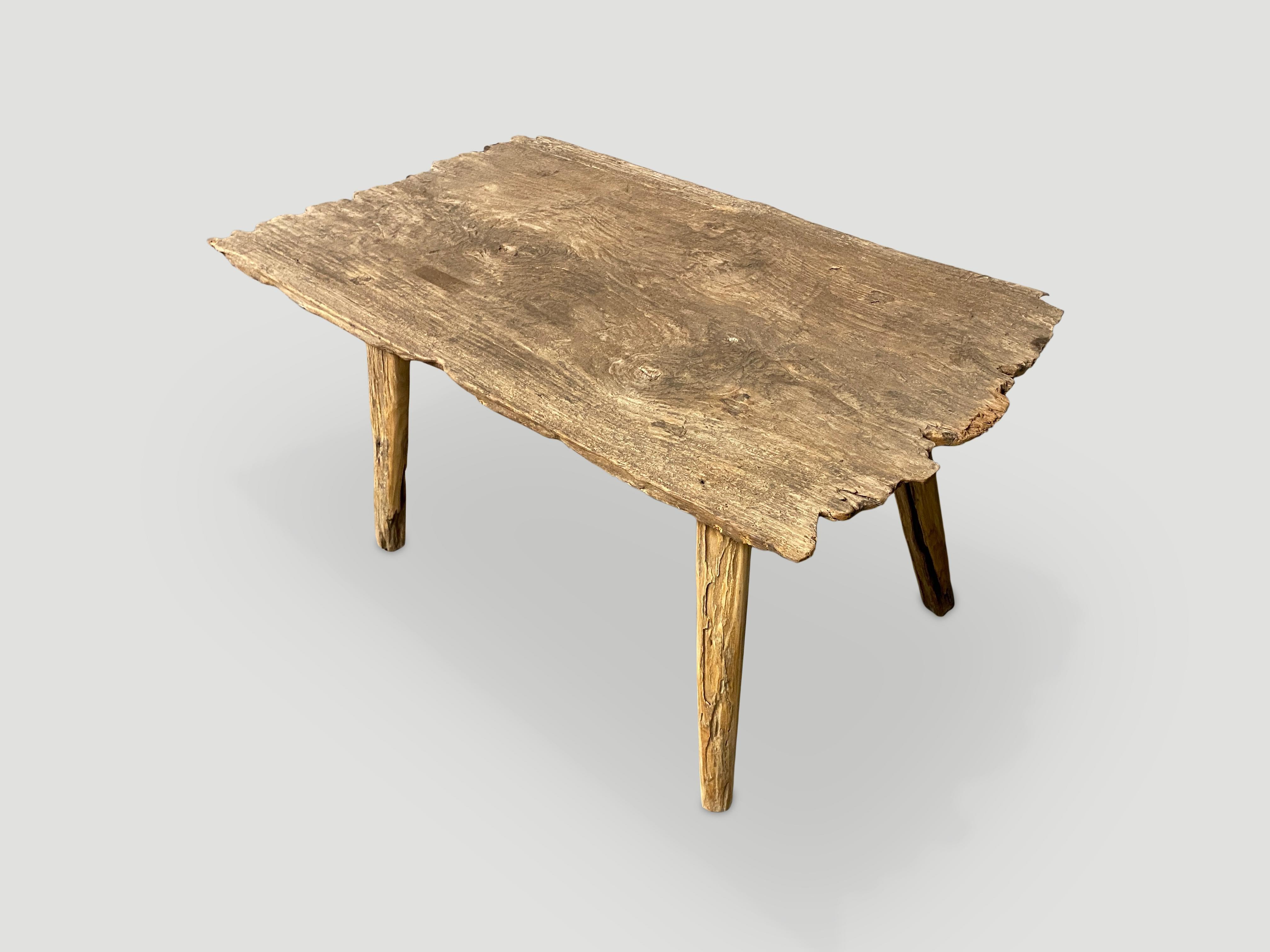 Reclaimed teak wood coffee table. This coffee table was made in the spirit of Wabi-Sabi, a Japanese philosophy that beauty can be found in imperfection and impermanence. It is a beauty of things modest and humble. A beauty of things