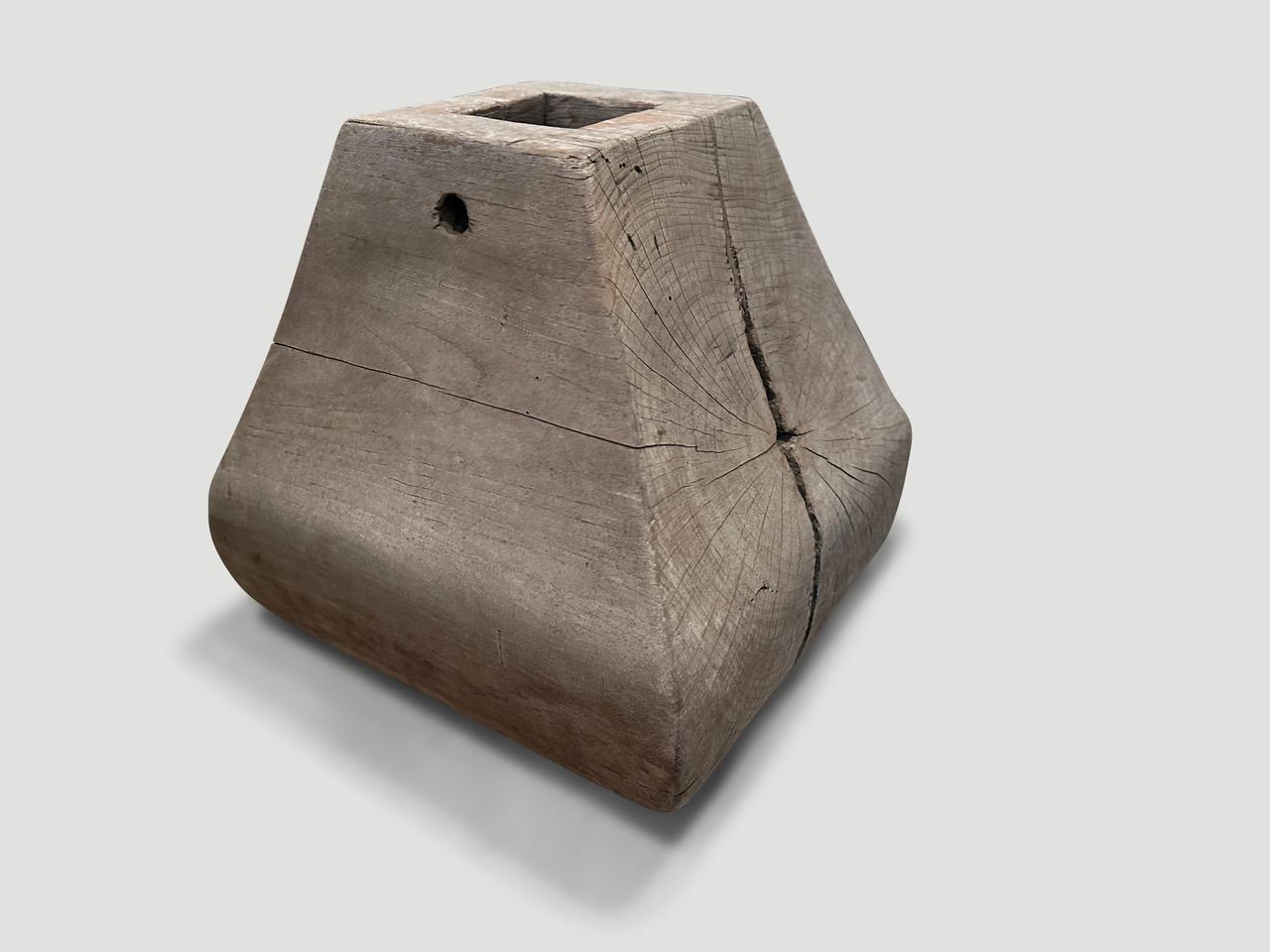 Beautiful hand carved antique column base. The shape is unique. Great as a sculptural candle holder or low side table. We have a pair. The images and price reflect the one shown. Circa 1950. Full dimensions; Top; 5 1/4″ x 5 1/4″ x bottom 11.5″ x 10.