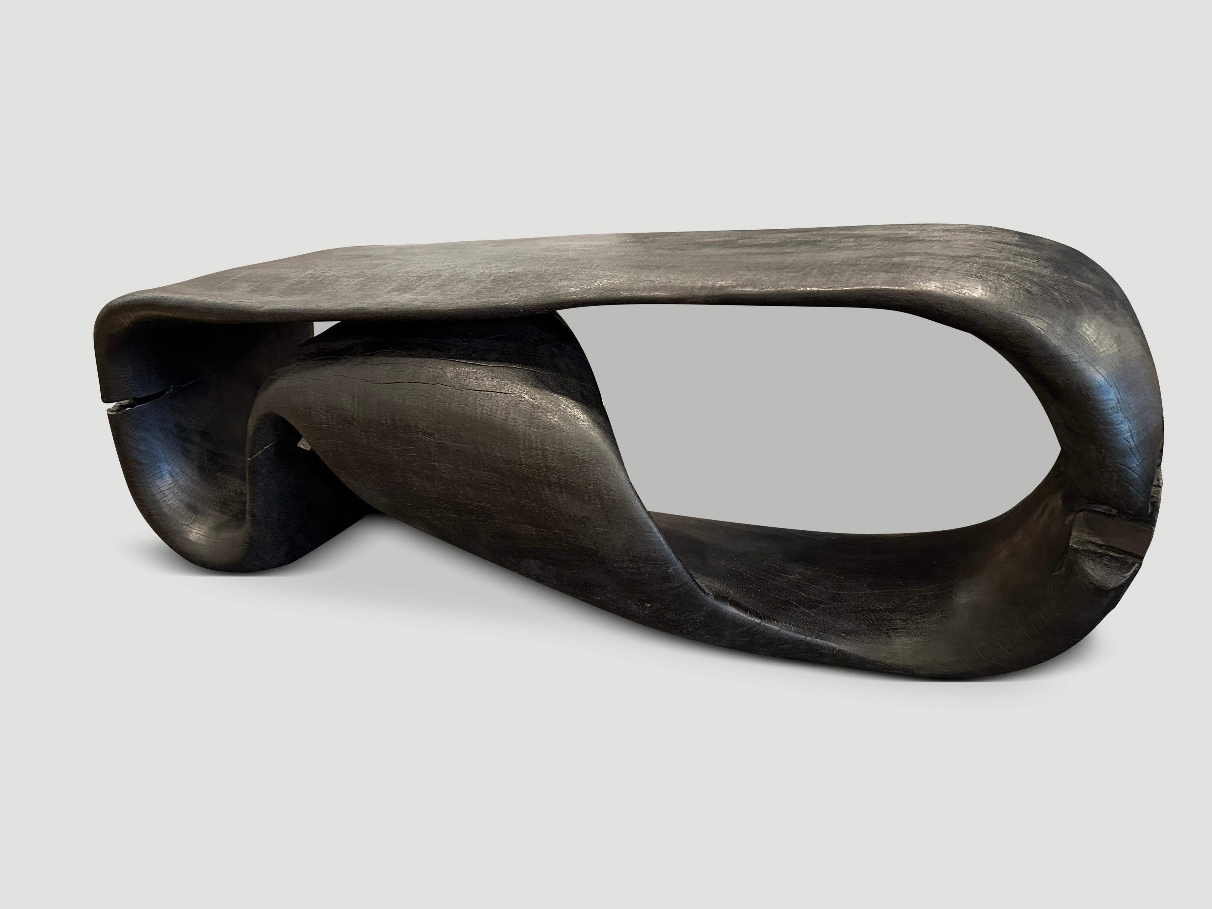 Beautiful one of a kind rare coffee table made from a single piece of suar wood. This seamless coffee table is both sculptural and usable. We lightly charred it revealing the beautiful wood grain. It’s all in the details.

The Triple Burnt