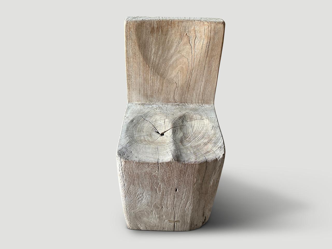 Beautiful chair hand carved from a single reclaimed teak wood block. Both usable and sculptural. We bleached the wood revealing the unique wood grain and added a butterfly detail to the front. All one of a kind.

This chair was hand made in the