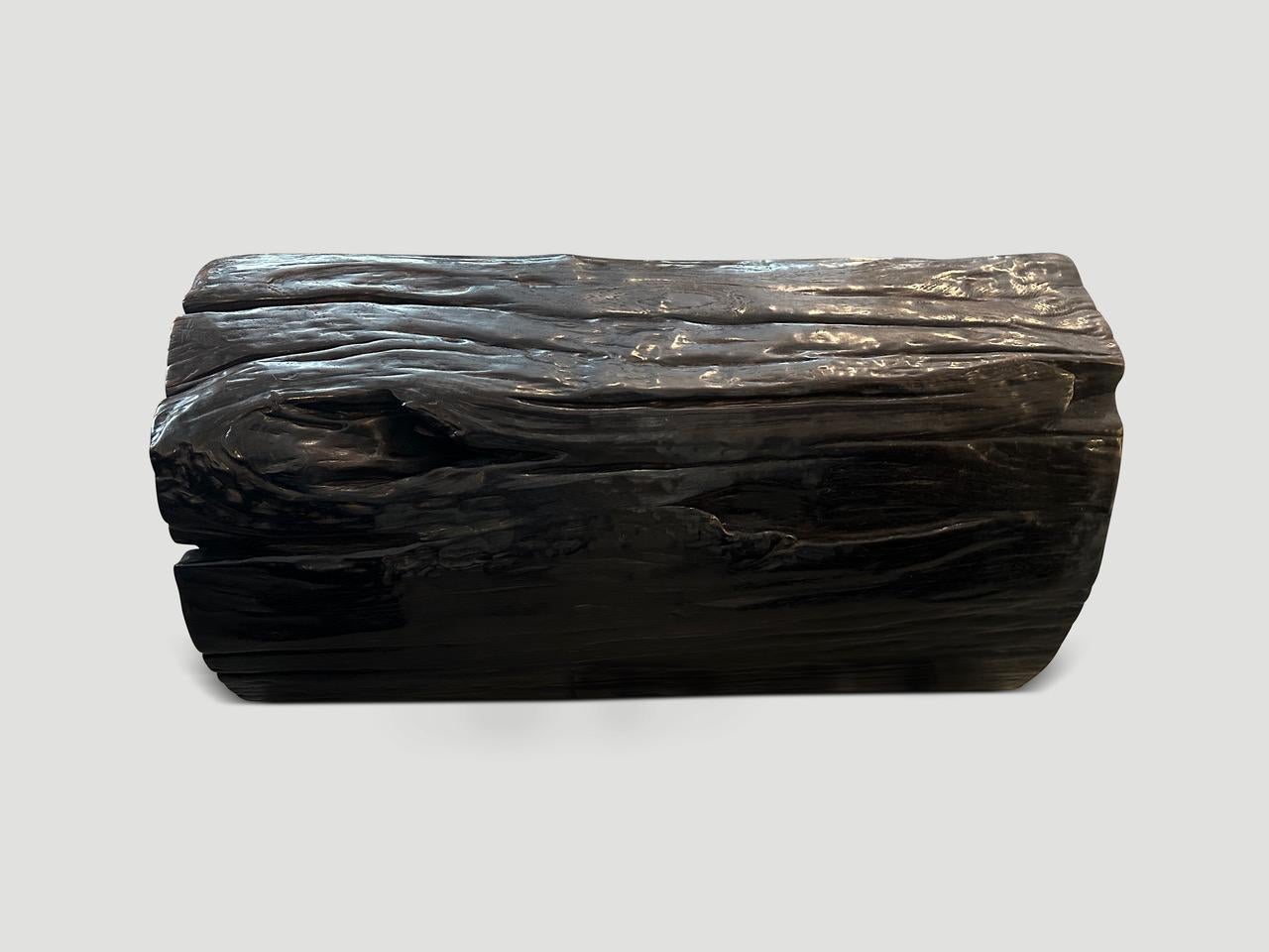 Impressive hollowed out teak wood pedestal or bench. Beautiful unique erosion detail on this one hundred year old wood. We have a pair cut from the same log. The images and price reflect one. As a bench the dimensions are 34 x 17 x 17” high.

Own