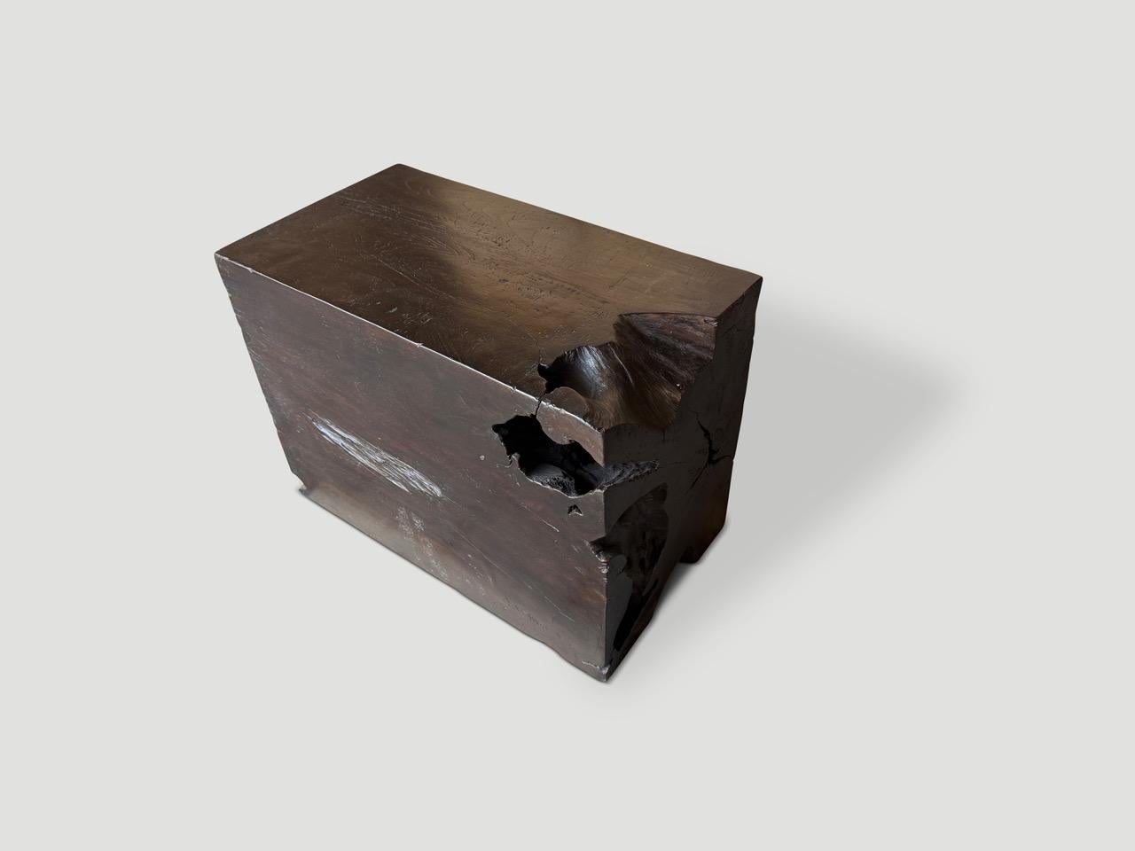 A century old teak block is repurposed into this one of a kind side table or coffee table whilst respecting the natural organic wood. Stained espresso and polished with a natural oil revealing the beautiful wood grain. It’s all in the details.

This