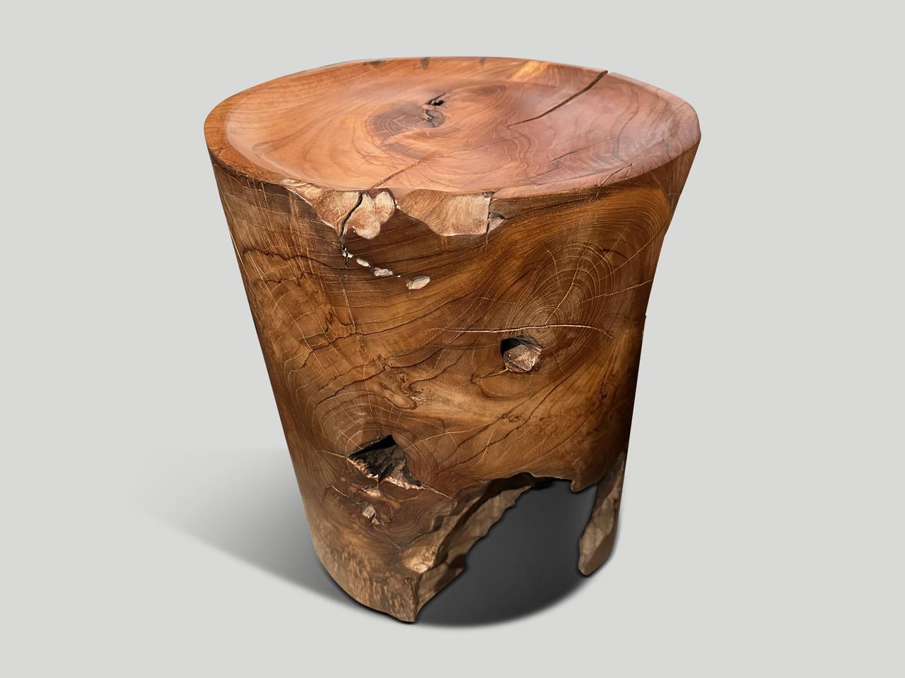 Natural organic formed reclaimed teak root side table. We hand carved the top section into a tray style and polished the aged teak with a natural oil revealing the beautiful wood grain. The inner sections are sanded and left unpolished in contrast.