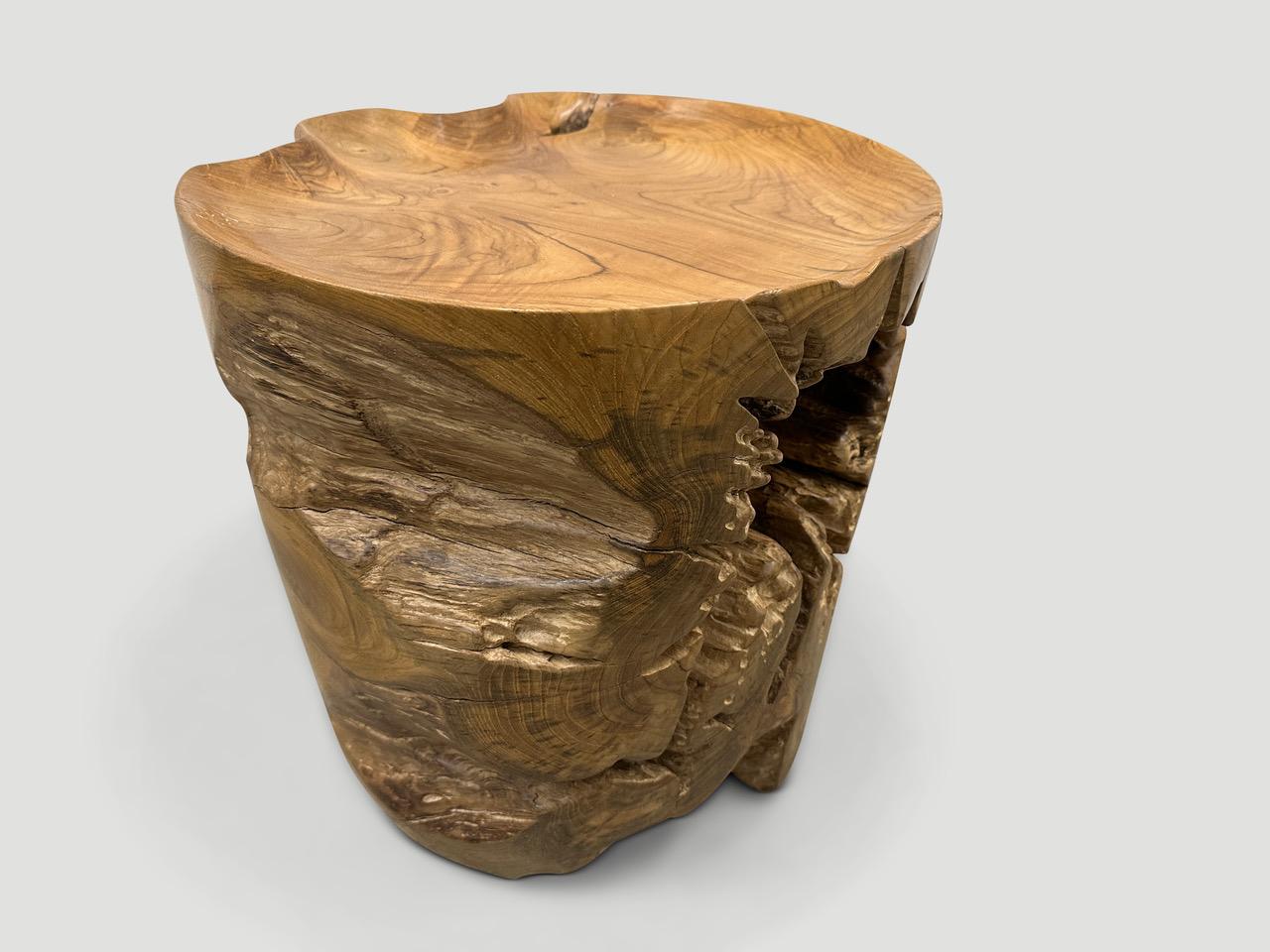 Natural organic formed reclaimed teak wood root side table. We hand carved the top section into a tray style and polished the aged teak with a natural oil revealing the beautiful wood grain. The inner sections are sanded and left unpolished in