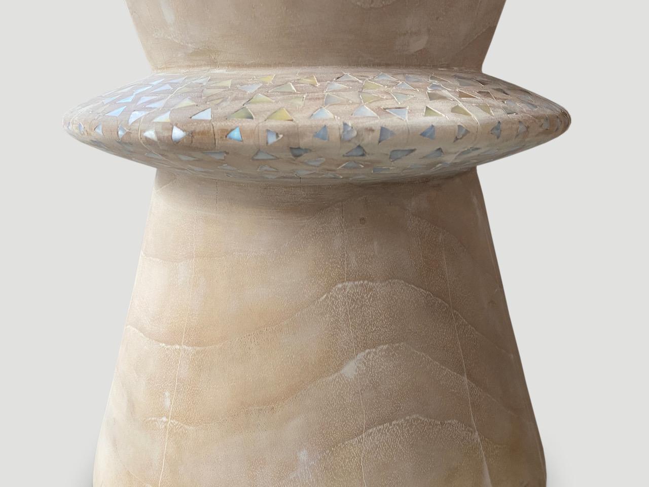 Beautiful hand carved teak wood side table with a light white wash finish and added shell inlay to the center section. It’s all in the details. Custom stains available. Please inquire.

Own an Andrianna Shamaris Original.

Andrianna Shamaris. The