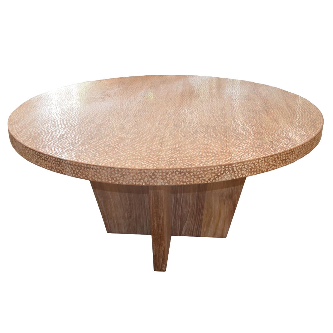 Reclaimed teak wood with beautiful hand shell inlay over the entire top and edge. Resting on a modern cross teak base.

Own an Andrianna Shamaris original.

Andrianna Shamaris. The Leader In Modern Organic Design.