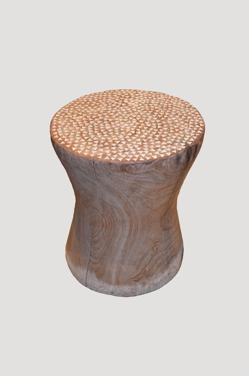 Weathered teak side table or stool with added shell inlay to the top.

Andrianna Shamaris. The leader in modern organic design.