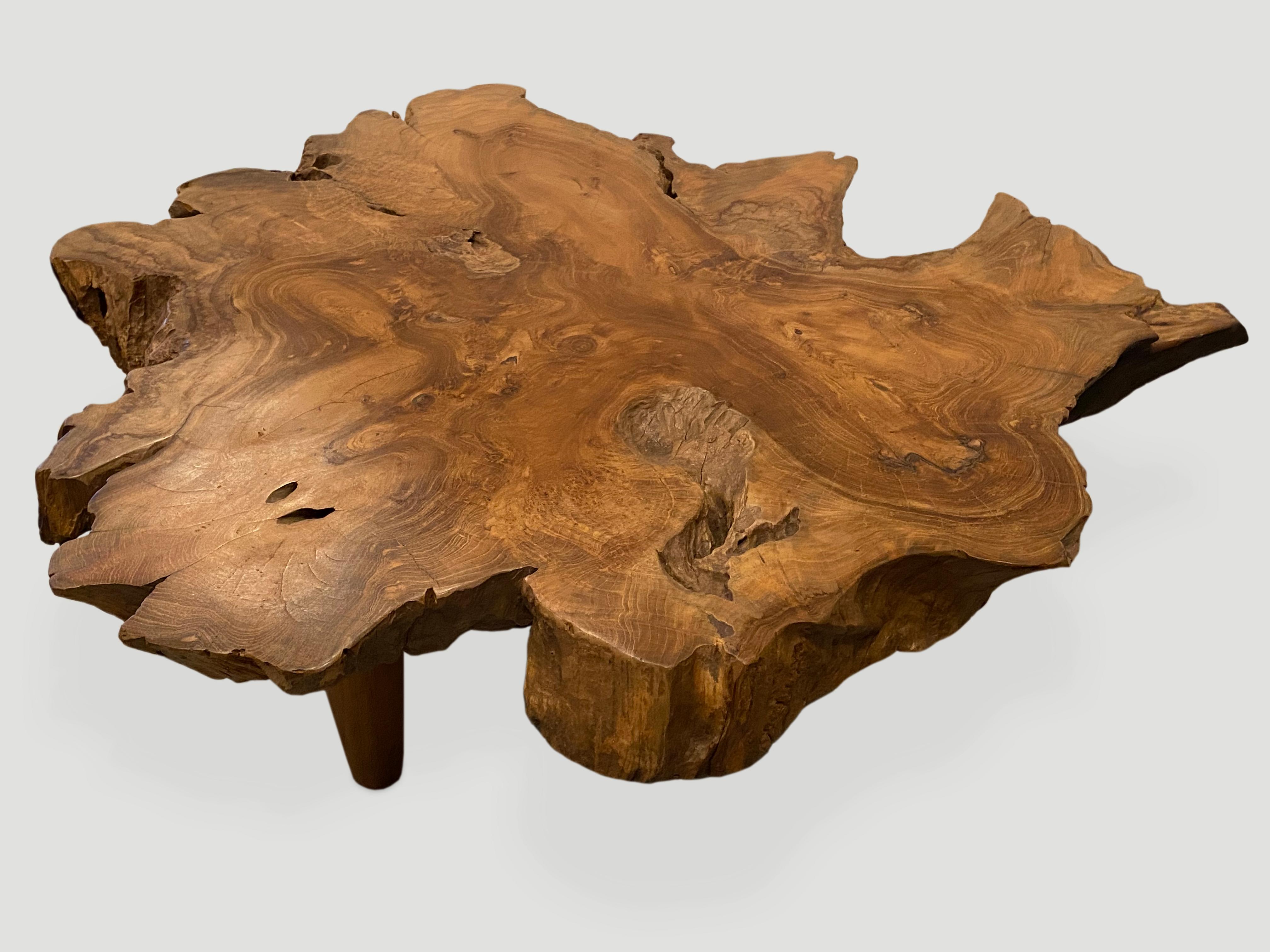 Reclaimed teak single slab coffee table with a natural oil finish. Floating on midcentury style legs. Organic with a twist.

Own an Andrianna Shamaris original.

Andrianna Shamaris. The Leader In Modern Organic Design™.