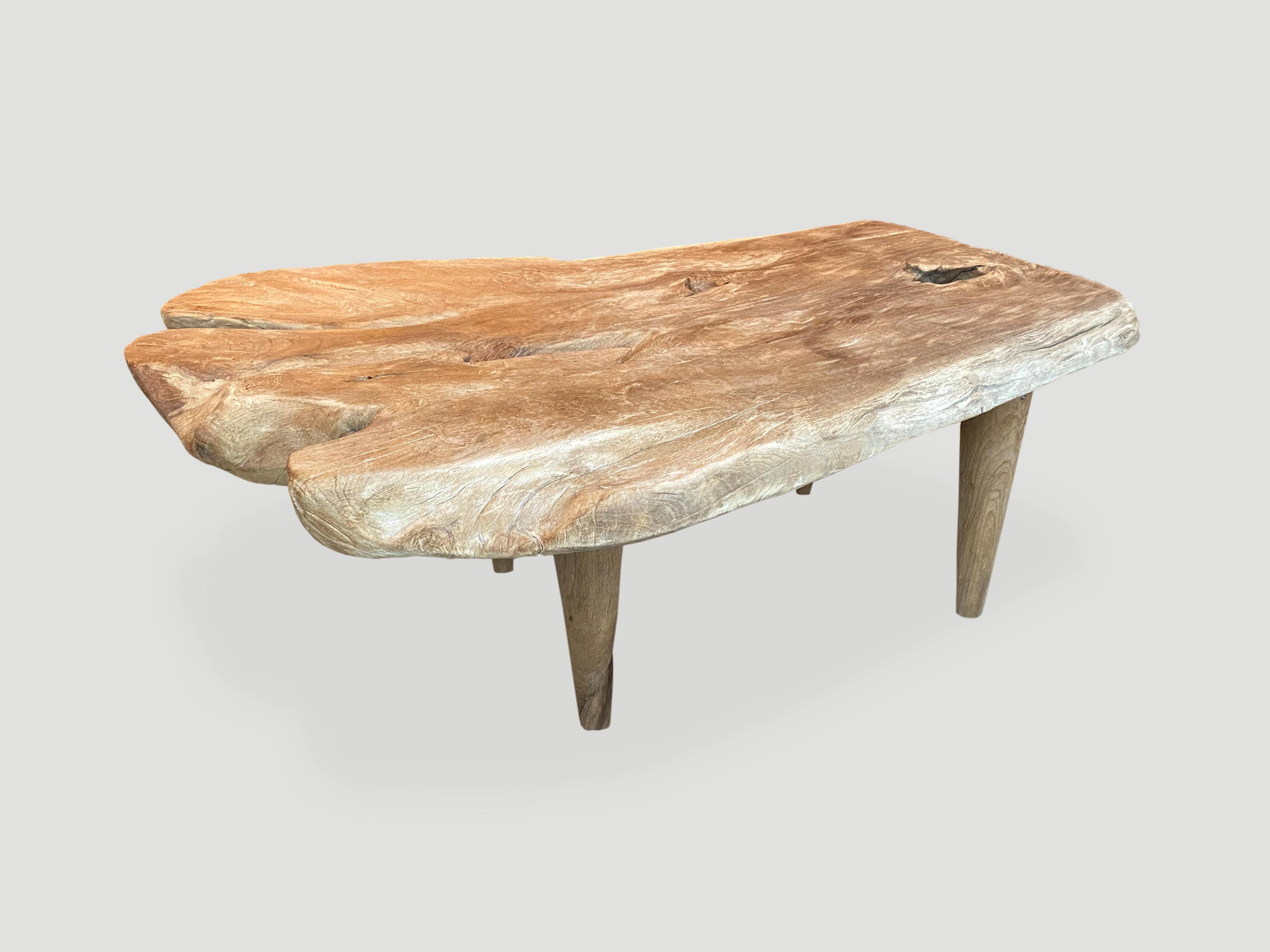 Reclaimed three inch thick teak wood coffee table with a natural oil finish. Floating on midcentury style legs. Organic with a twist.

Own an Andrianna Shamaris original.

Andrianna Shamaris. The Leader In Modern Organic Design.