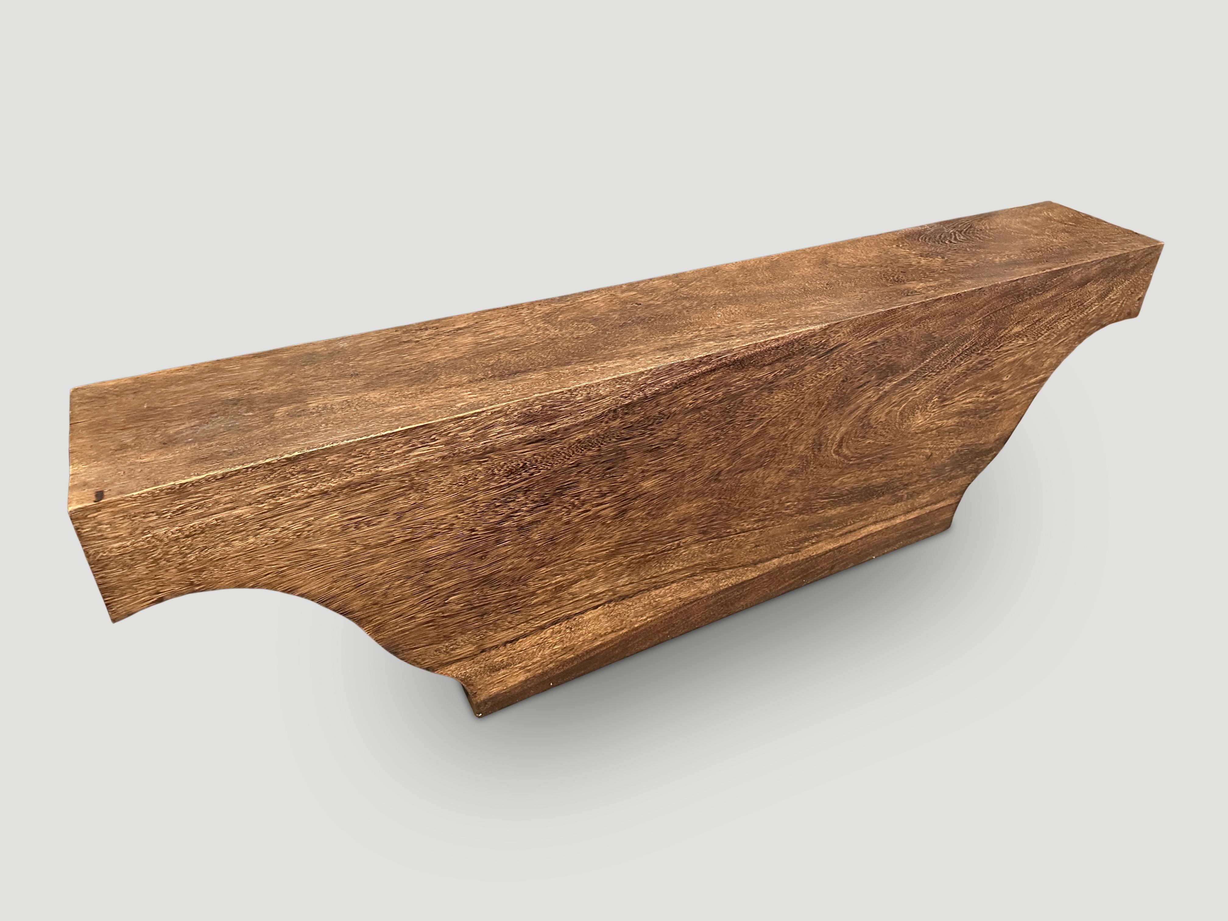 Impressive bench or console made from a single piece of reclaimed Suar wood. A great shape with the top at 63