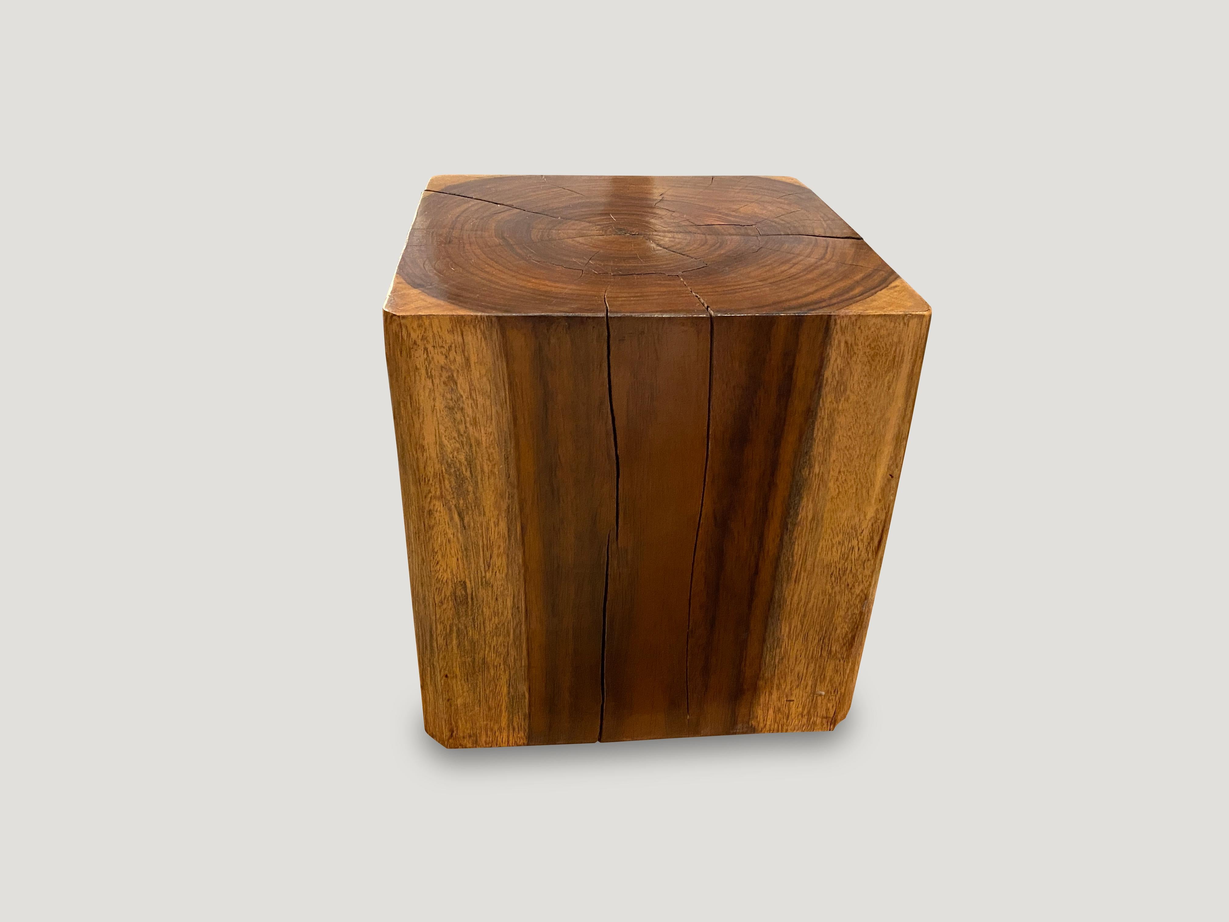 Midcentury style reclaimed sono wood side table. Natural contrasting color tones in this sono wood cube.

This side table was sourced in the spirit of wabi-sabi, a Japanese philosophy that beauty can be found in imperfection and impermanence. It