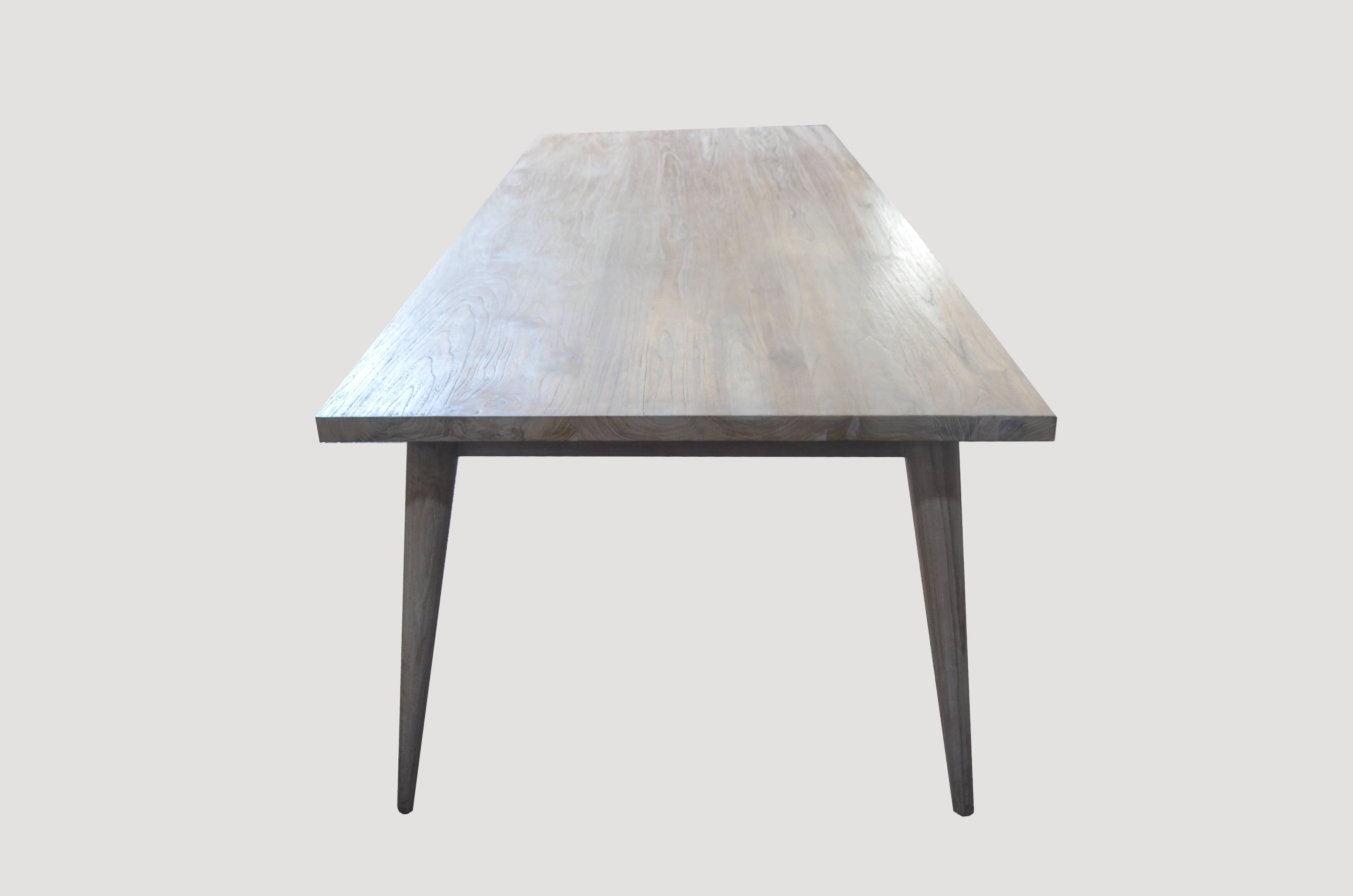 St. Barts white washed reclaimed teak wood dining table with modern lines set on a mid century style base.

The St. Barts Collection features an exciting new line of organic white wash, bleached and natural weathered teak furniture. The reclaimed