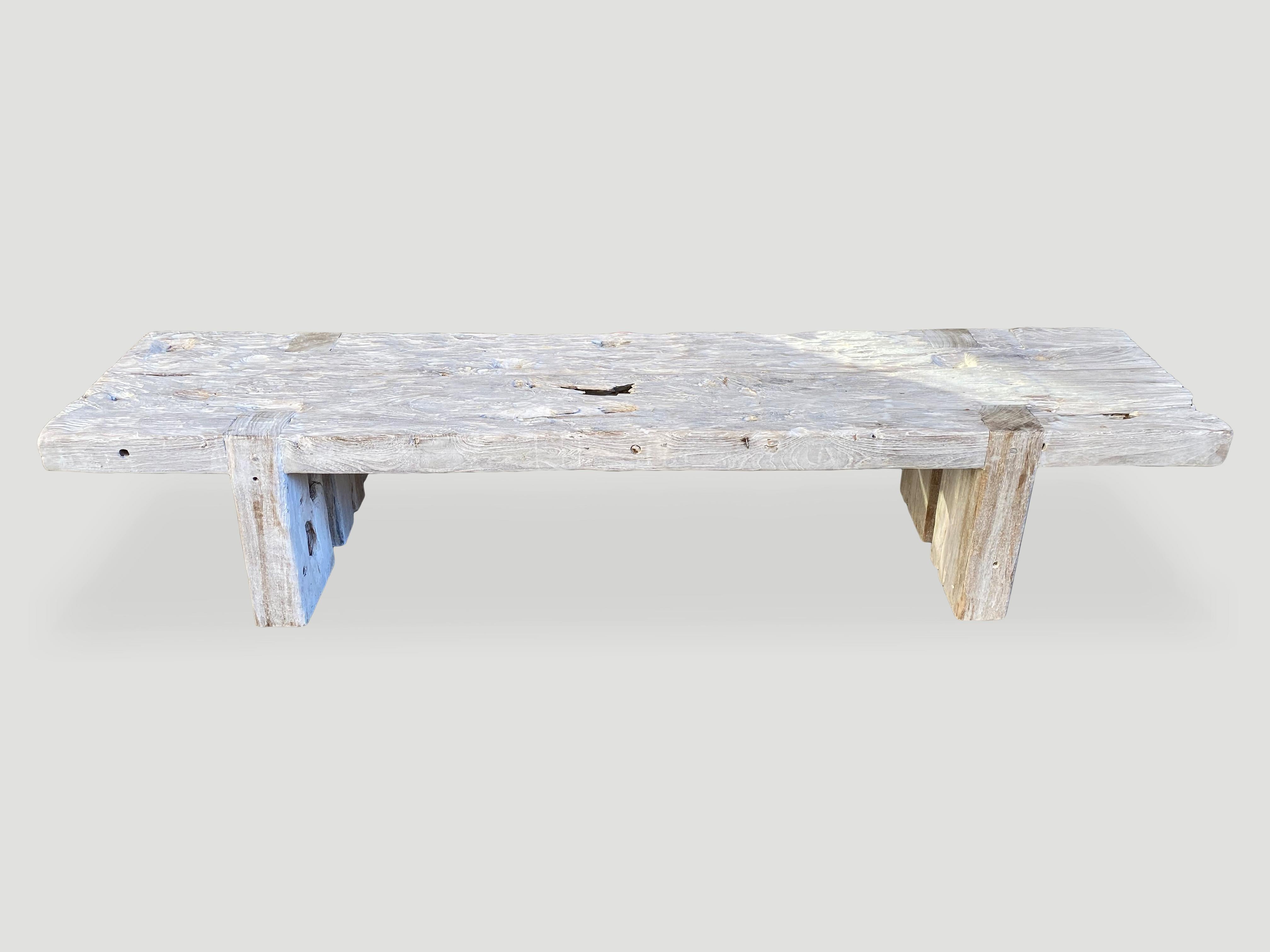 Beautiful reclaimed teak wood bench made from two 3” thick panels. We added the legs which are inlayed into the top, bleached the wood and then finished with a light white wash exposing the beautiful grain of this aged teak wood. 

The St. Barts