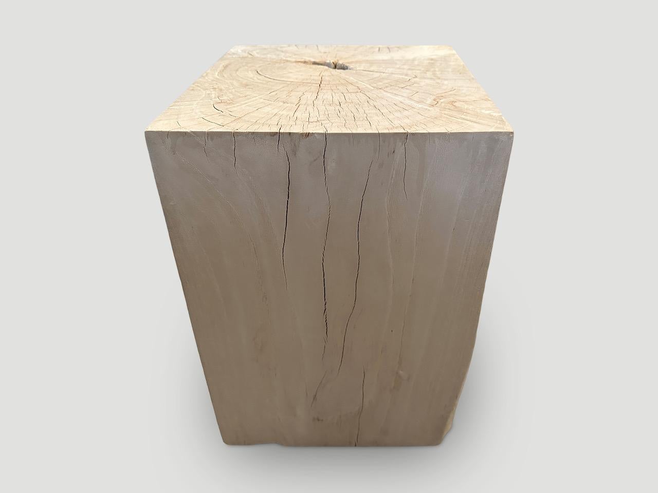 Reclaimed teak wood side table, hand carved whilst respecting the natural organic wood. Bleached to a bone finish. 

The St. Barts Collection features an exciting line of organic white wash, bleached and natural weathered teak furniture. The