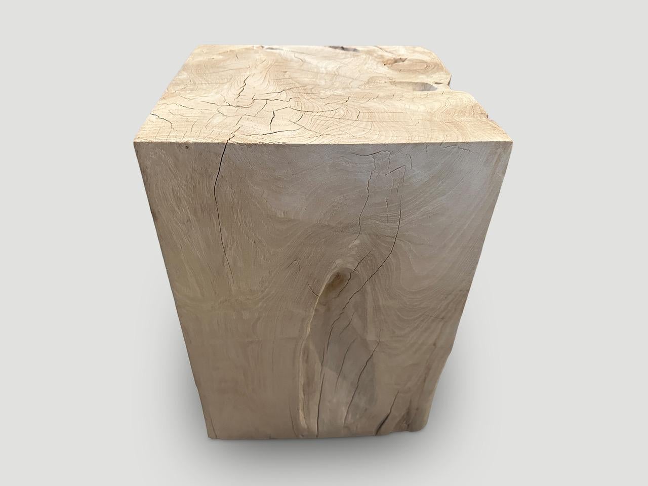 Reclaimed teak wood side table, hand carved whilst respecting the natural organic wood. Bleached to a bone finish. We have a collection. The images reflect the one shown. 

The St. Barts Collection features an exciting line of organic white wash,