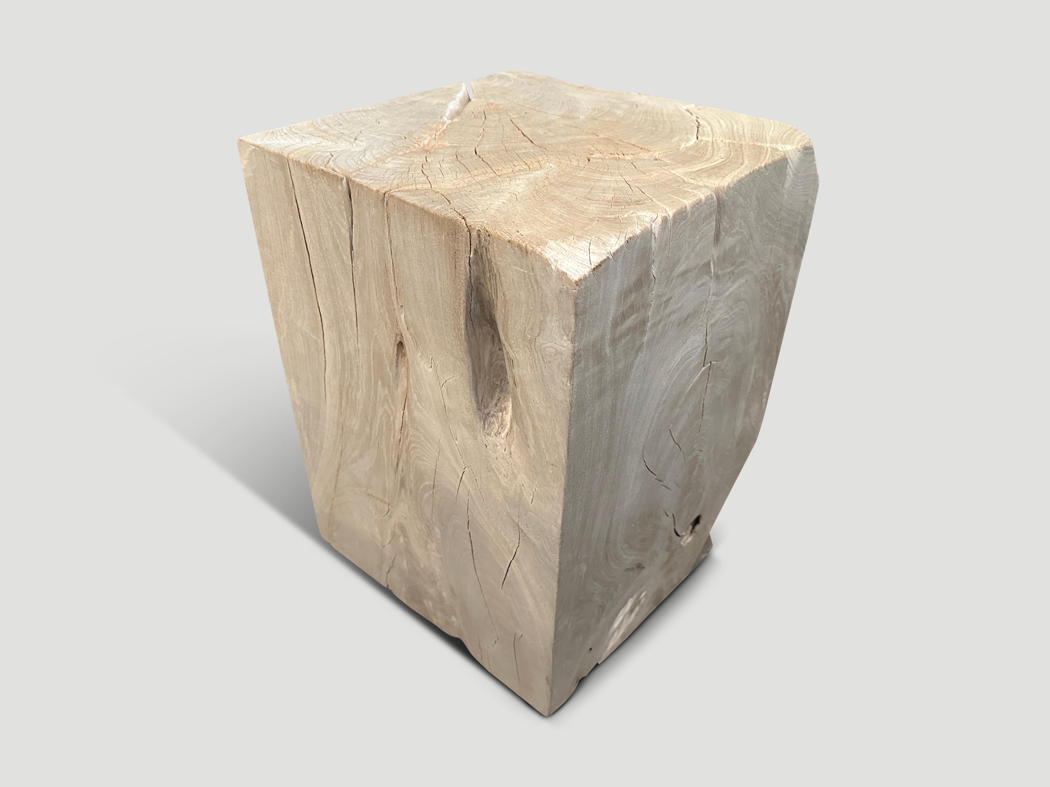 Reclaimed teak wood side table, hand carved whilst respecting the natural organic wood. Bleached to a bone finish. We have a collection. The images reflect the one shown. 

The St. Barts Collection features an exciting line of organic white wash,