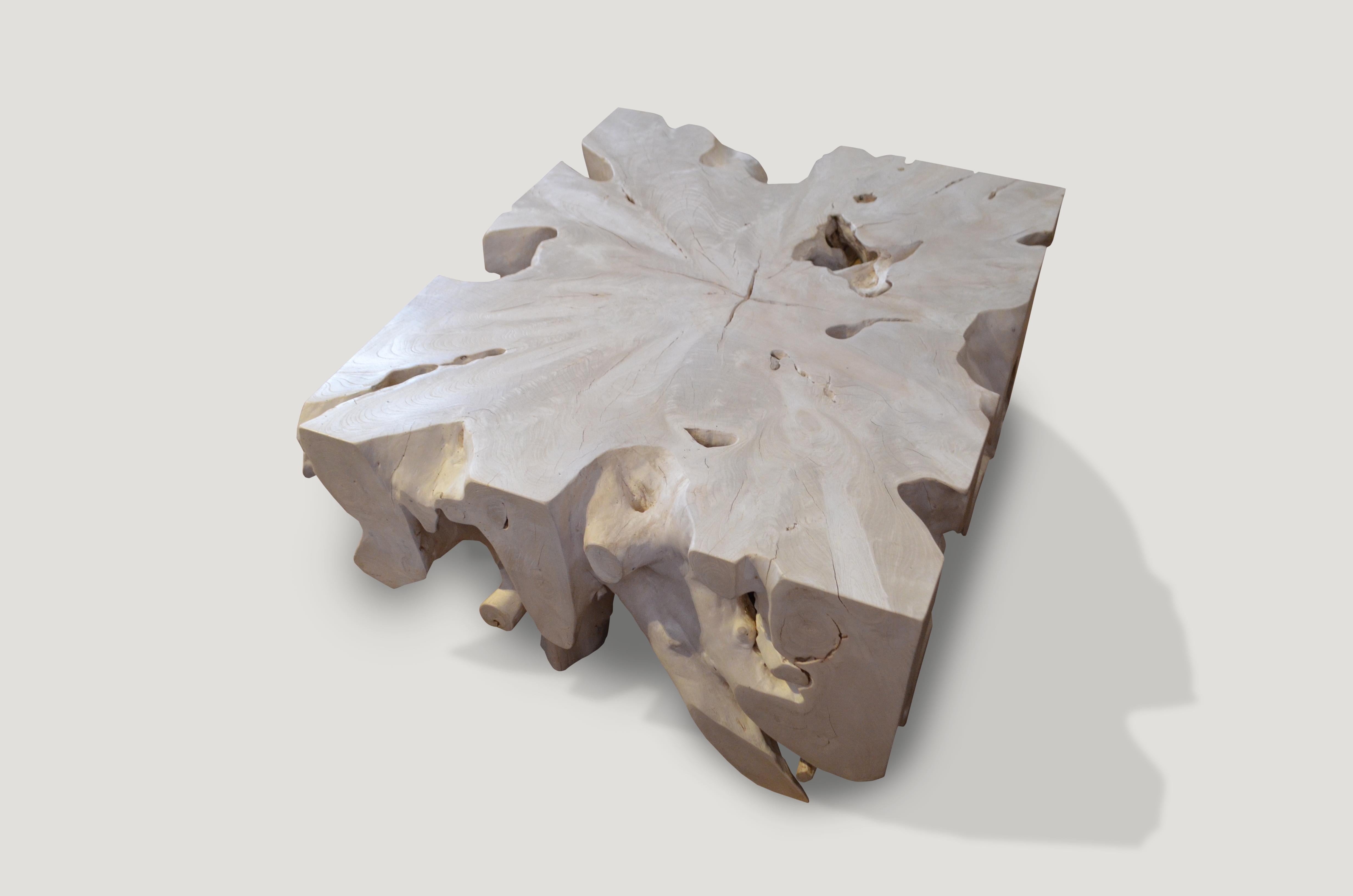 Single root coffee table hand-carved in to this usable shape.

The St. Barts collection features an exciting new line of organic white wash and natural weathered teak furniture. The reclaimed teak is left to bake in the sun and sea salt air for over