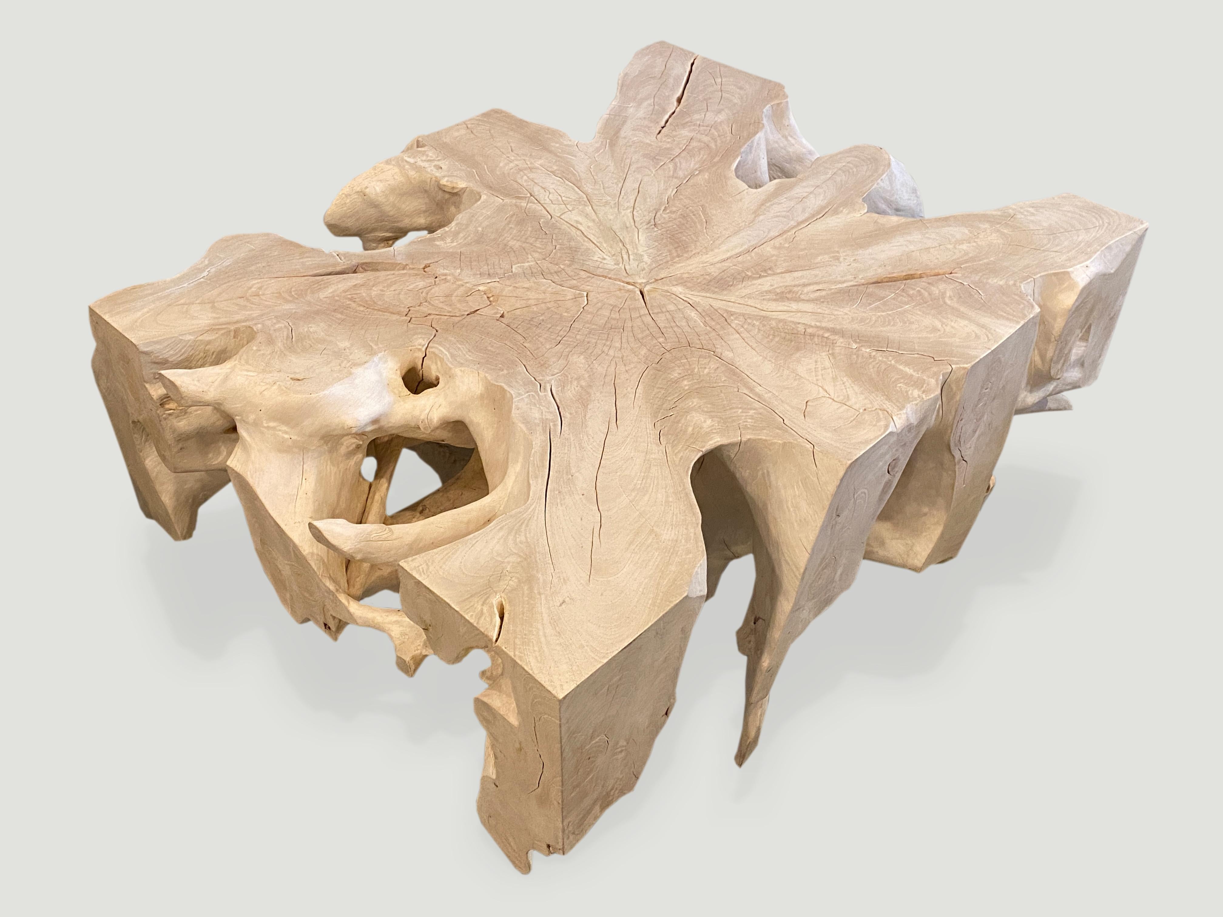 Bleached teak wood root coffee table or if turned on the side a console. Hand carved from a single reclaimed teak root.

The St. Barts collection features an exciting new line of organic white wash, bleached and natural weathered teak furniture.