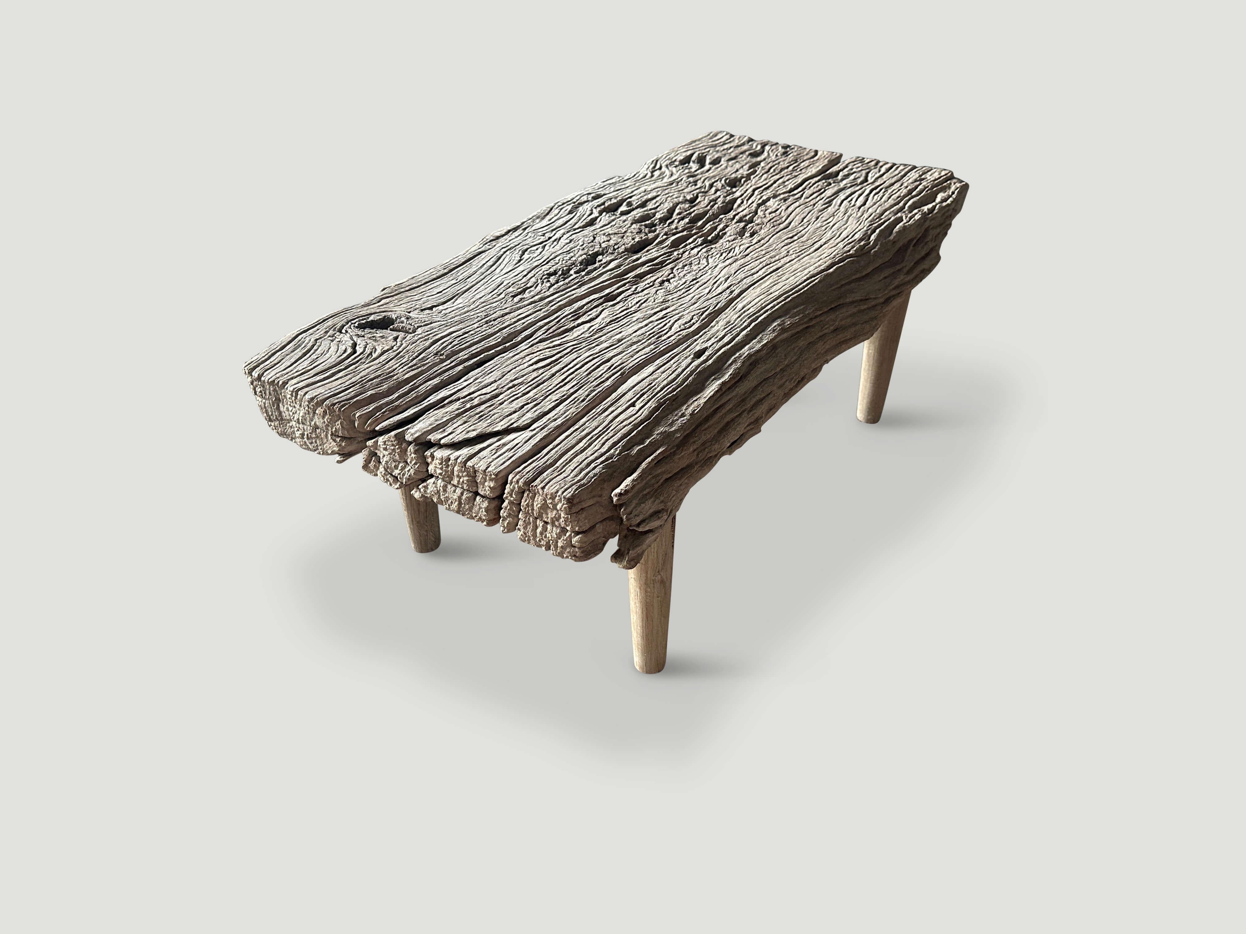A single three inch thick slab of teak wood hand made into this beautiful coffee table or bench with unique natural character. We added smooth teak minimalist legs to this unique ancient wood. It’s all in the details.

The St. Barts Collection