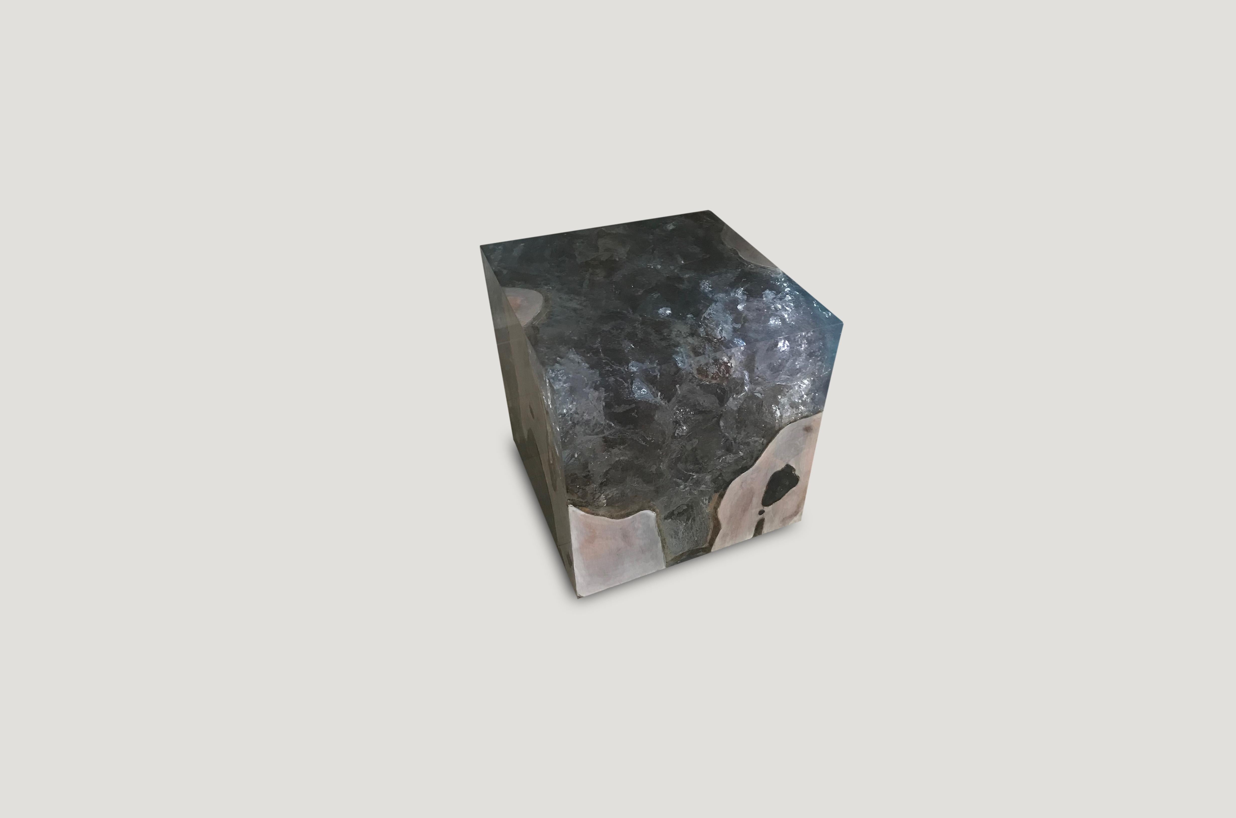 The St. Barts side table is a unique variation of the teak and cracked resin cube. Blue resin is cracked and added into the natural grooves of the bleached teak wood, sanded and finished with a high polish.

The St. Barts Collection features an