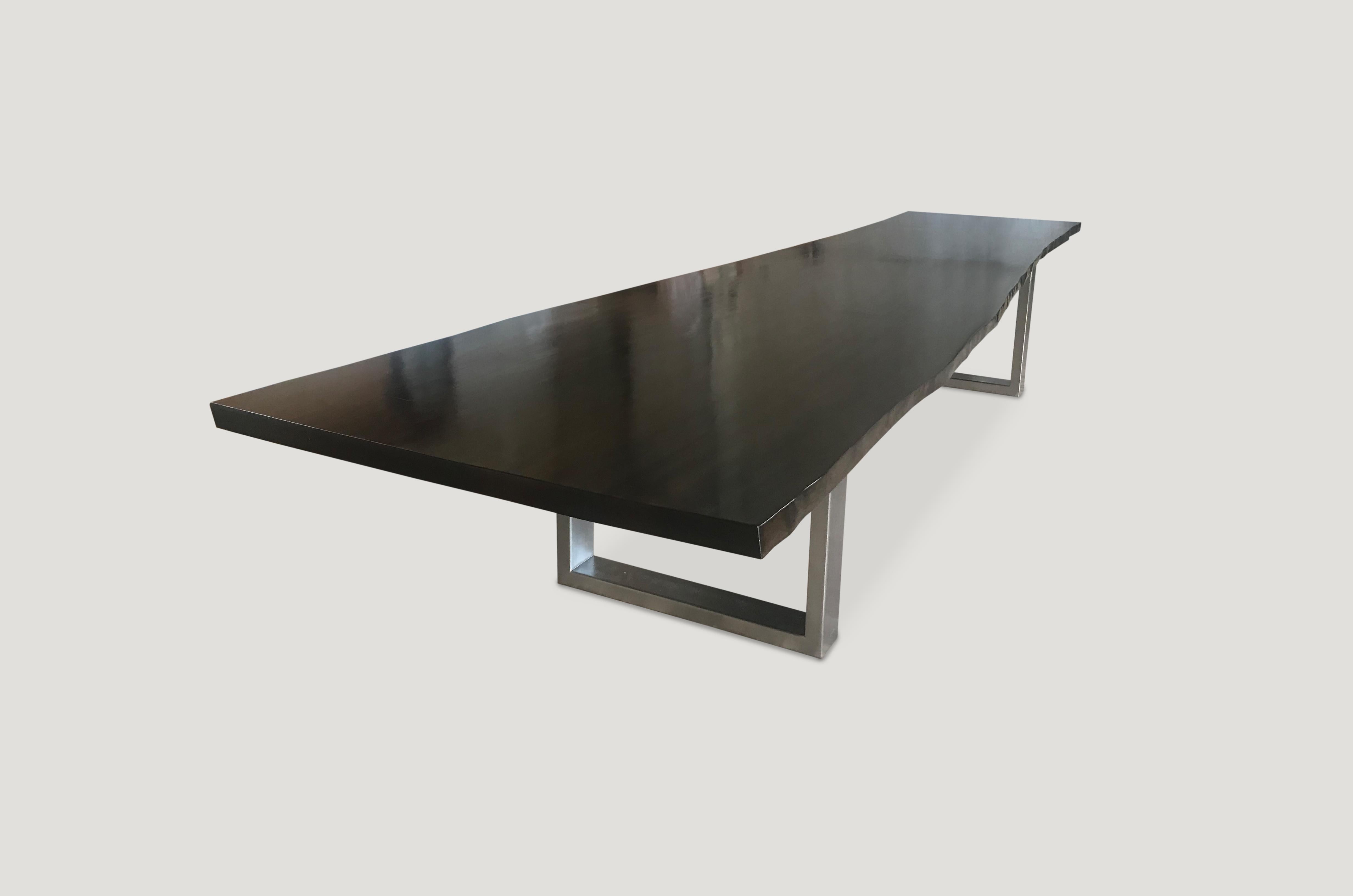 Impressive live edge dining table made from sycamore with a hand French polish finish and custom brushed stainless steel base.

Own an Andrianna Shamaris original.

Andrianna Shamaris. The Leader In Modern Organic Design™
