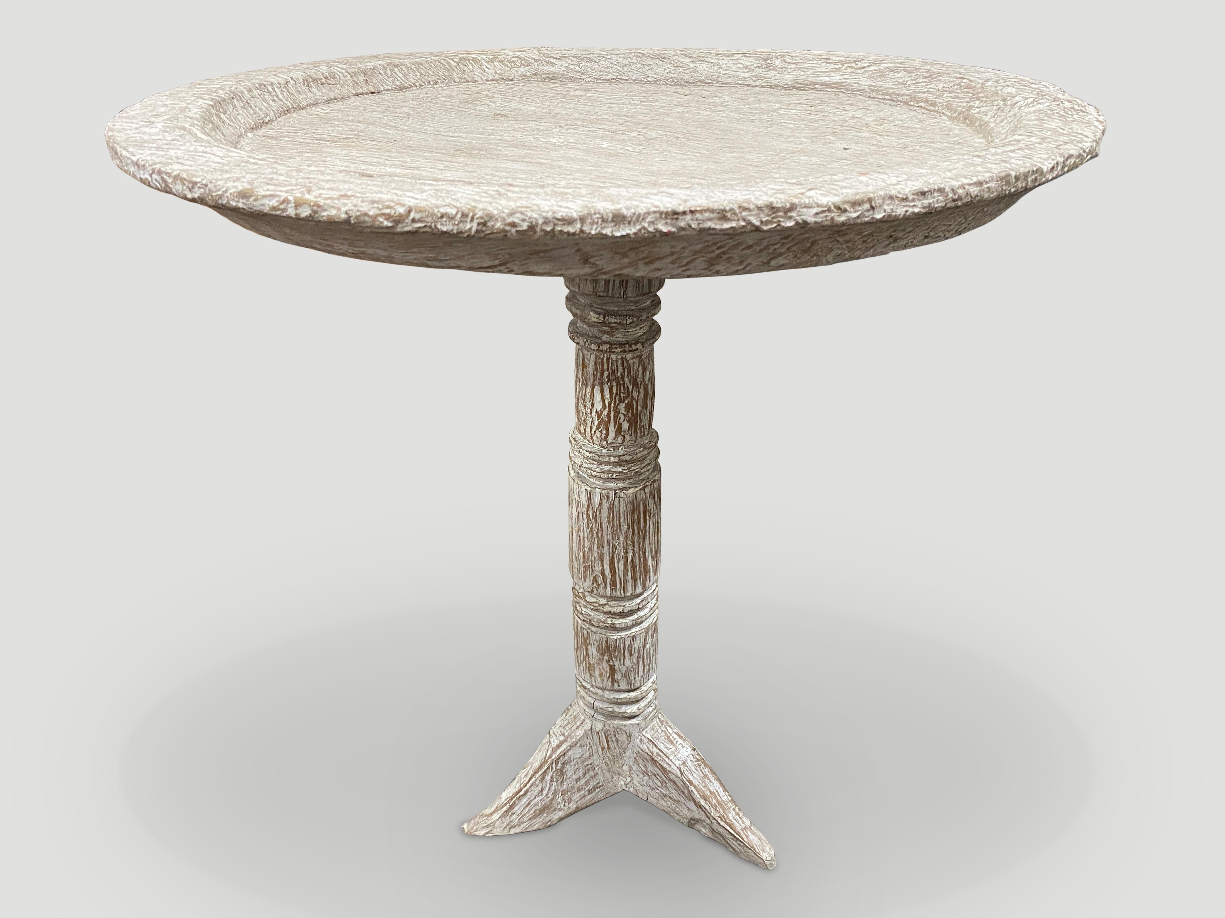 A beautiful antique three inch bevelled tray made from a single piece of wood is added to this hand carved base. Finished with a white washed ceruse revealing the beautiful wood grain. 

The St. Barts Collection features an exciting new line of