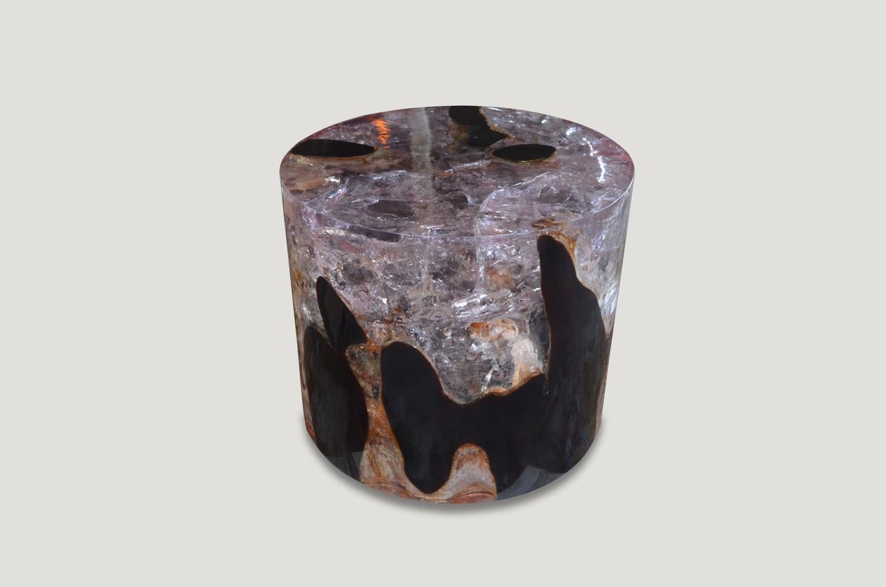 The cracked resin cocktail table is made from teak infused with resin. A dramatic piece due to the depth of the resin, which resembles a unique quartz crystal with many different facets. An impressive addition to any space.

The Cracked Resin